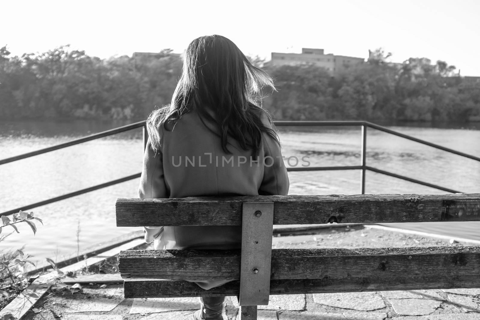 Woman sitting by IVYPHOTOS