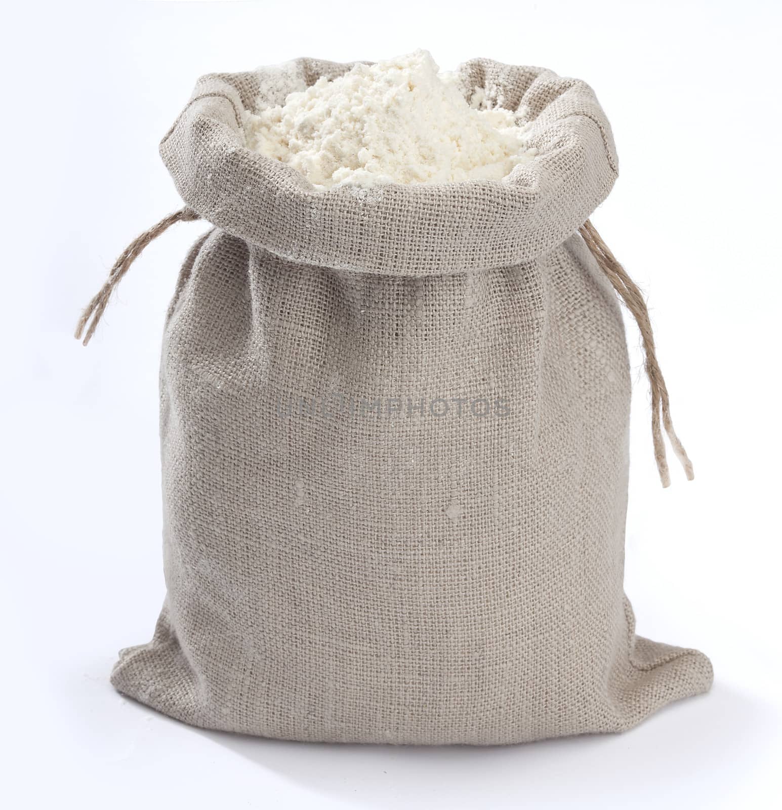 Isolated small sack with white flour on the white background