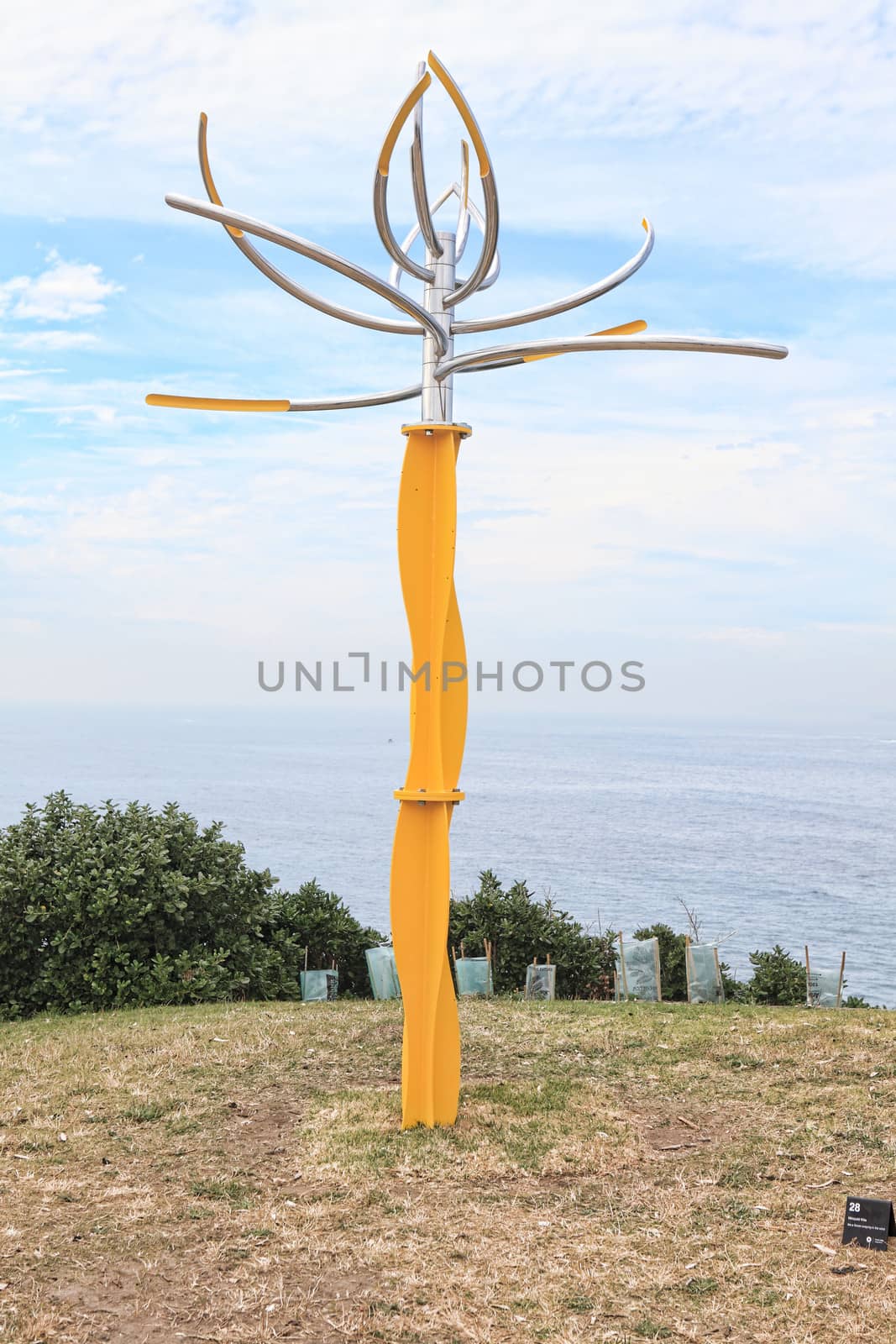 Bondi - Tamarama Beach, Australia - November 3,  2013: Sculpture By The Sea,  2013.Sculpture titled 'like a flower swaying in the wind ' by Hiroyuki Kita (Japan).  Medium - stainless steel, steel ball bearings, paint  $60000