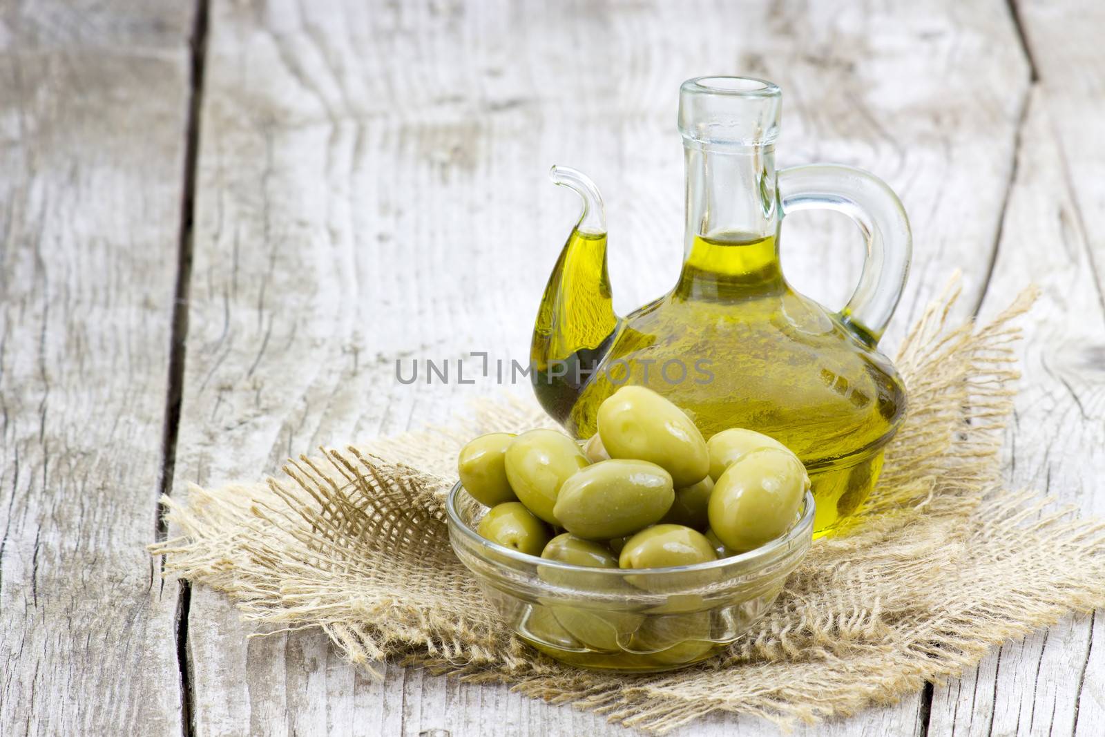 Olive oil and green olives