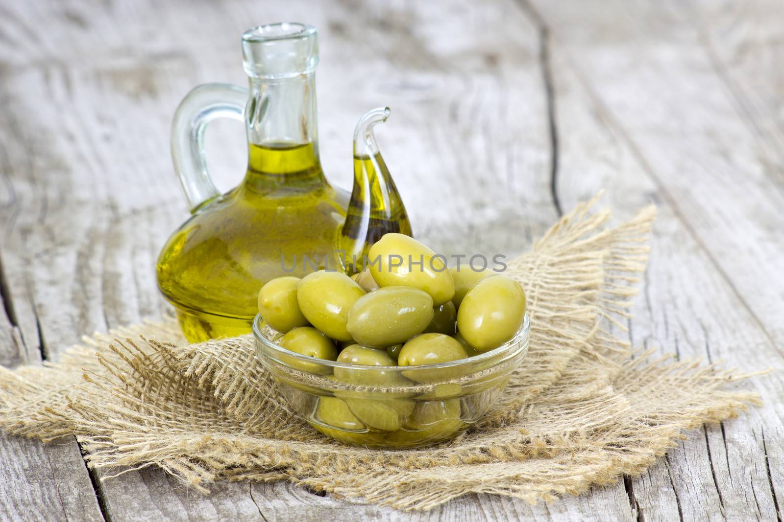 Olive oil and green olives