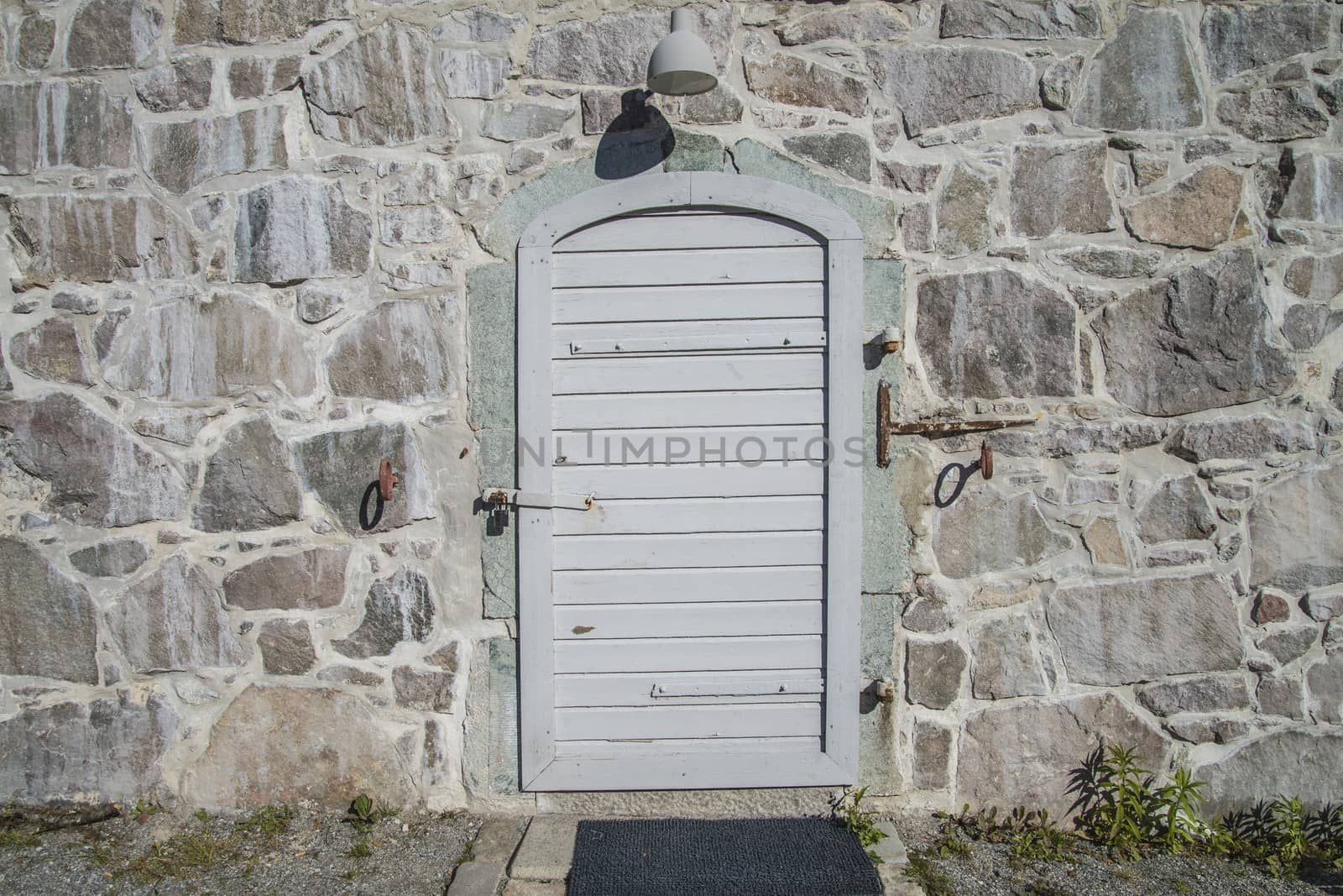 The building is on two floors, the ground floor was built in 1745 and the second floor was built in 1835. Image is shot at Fredriksten Fortress in Halden, Norway a day in September 2013.