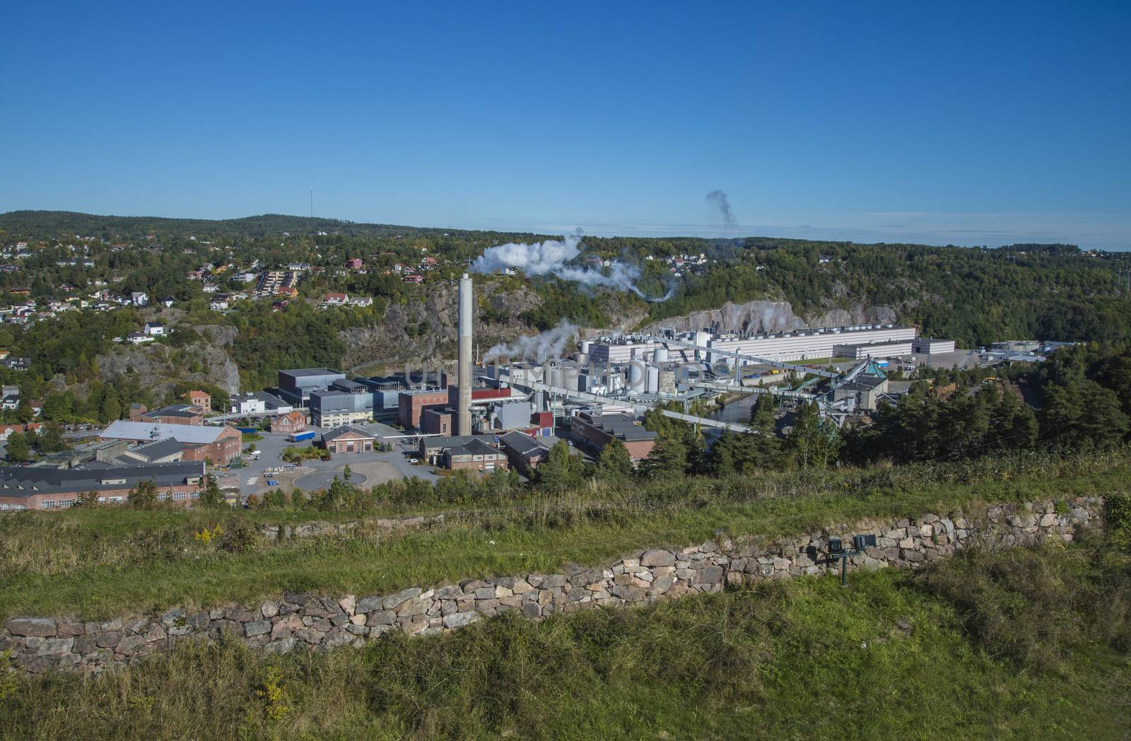 Saugbrugs paper factory which is a Norwegian paper factory in Halden. It is the oldest wood processing plant in Norway which is still in operation. Image is shot at Fredriksten fortress in Halden, Norway a day in September 2013.