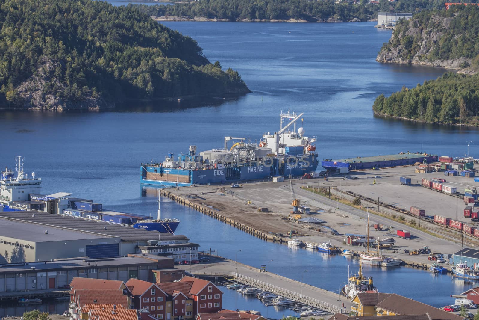 Image is shot from the top of Fredriksten fortress and shows the port of Halden, Norway and MV Eide Trader moored to the dock. Image is shot in September 2013