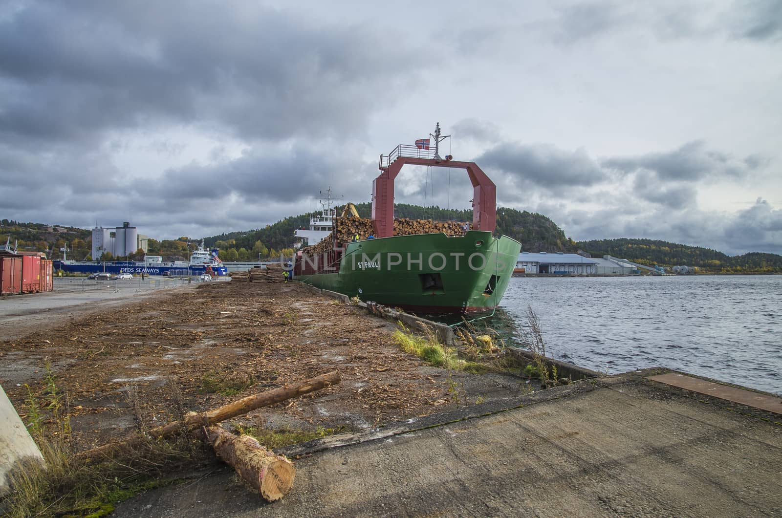 MV St.pauli leaving Halden, (Norway) harbor with a cargo full of timber. Photo is shot 9 October 2013. Vessel's Details: Ship type: General cargo, Year Built: 1983, Length x breadth: 92 m X 15 m, Gross Tonnage: 3075, Dead Weight: 3219 t, Flag: Gibraltar (GI).