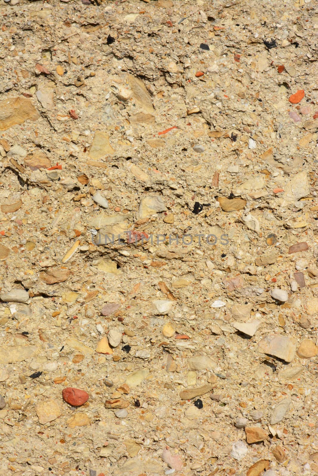 old concrete wall with small stone background