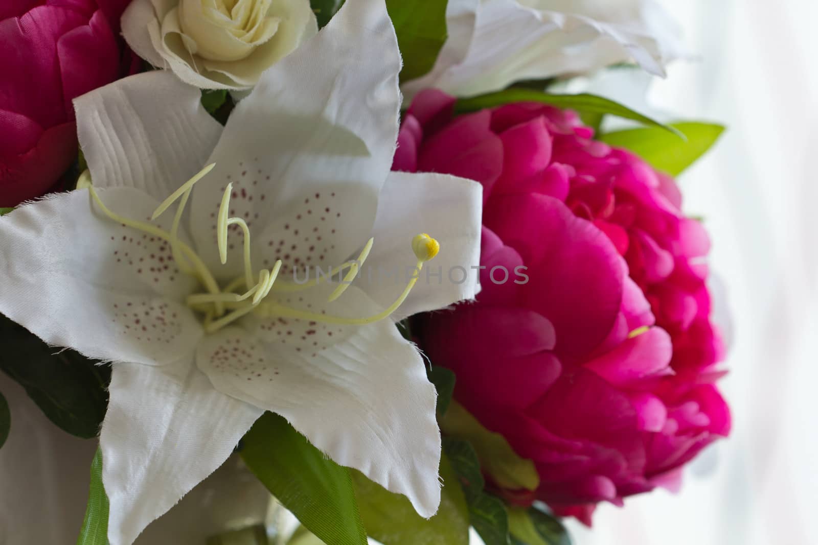 Bright and beautiful colors of plastic flowers