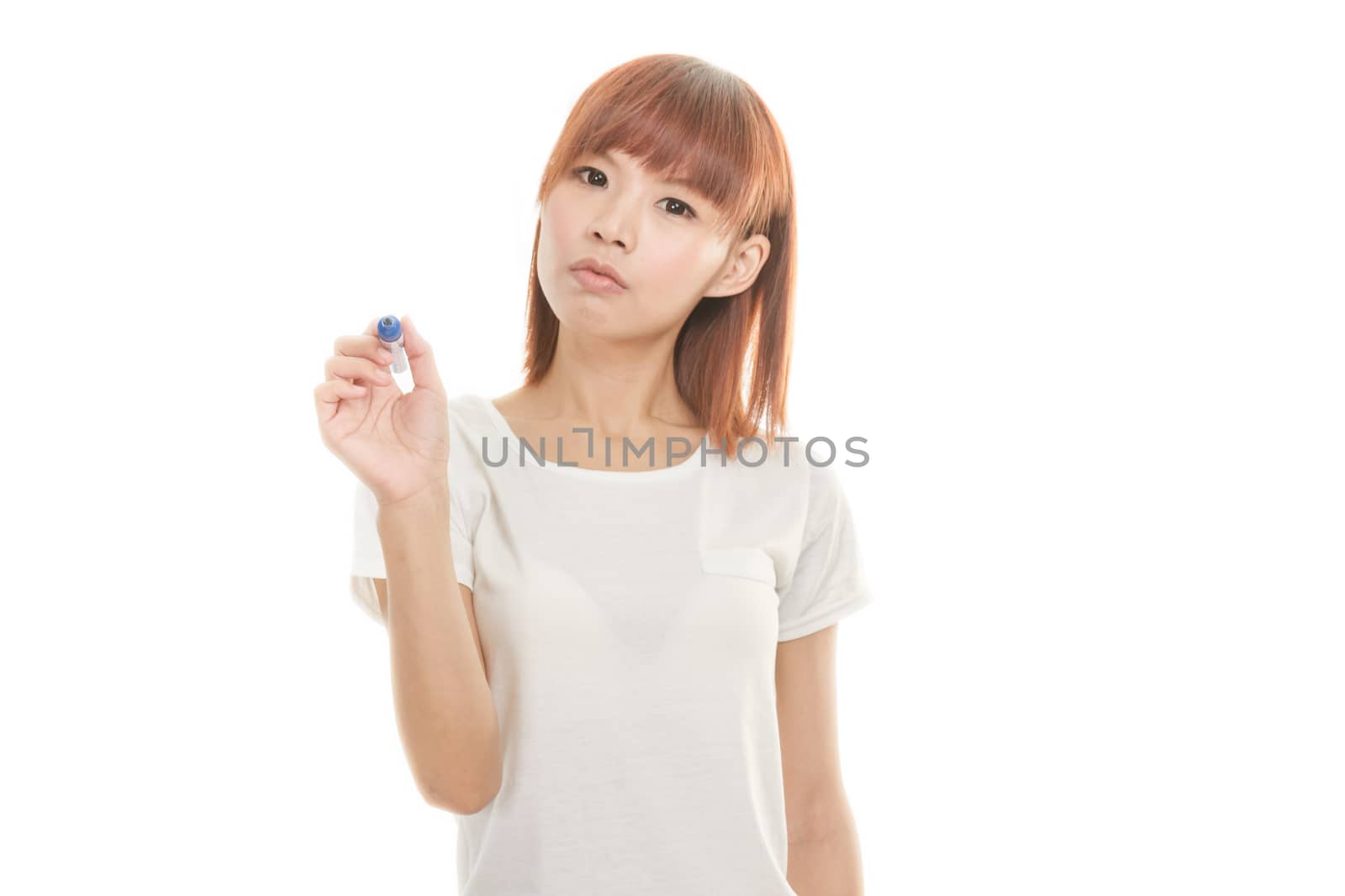 Asian woman writing with blue marker on imaginary board by imagesbykenny