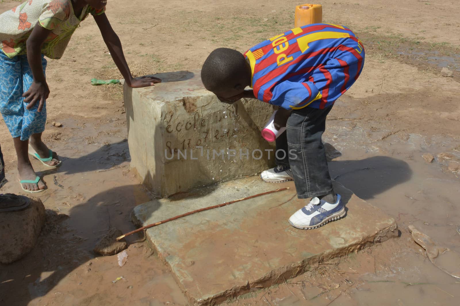 African children at the fountain