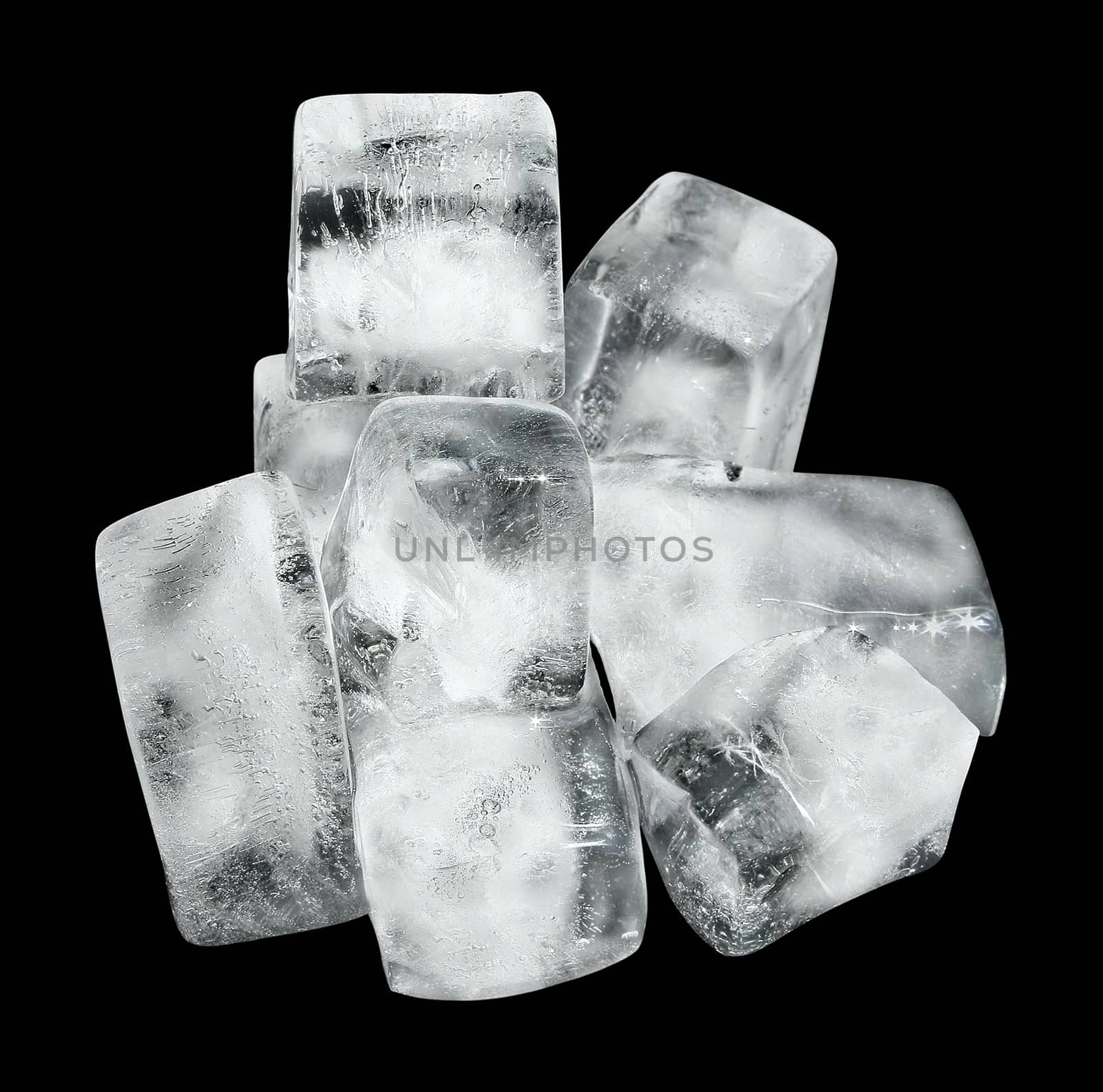 Cubes of ice on a black background.
