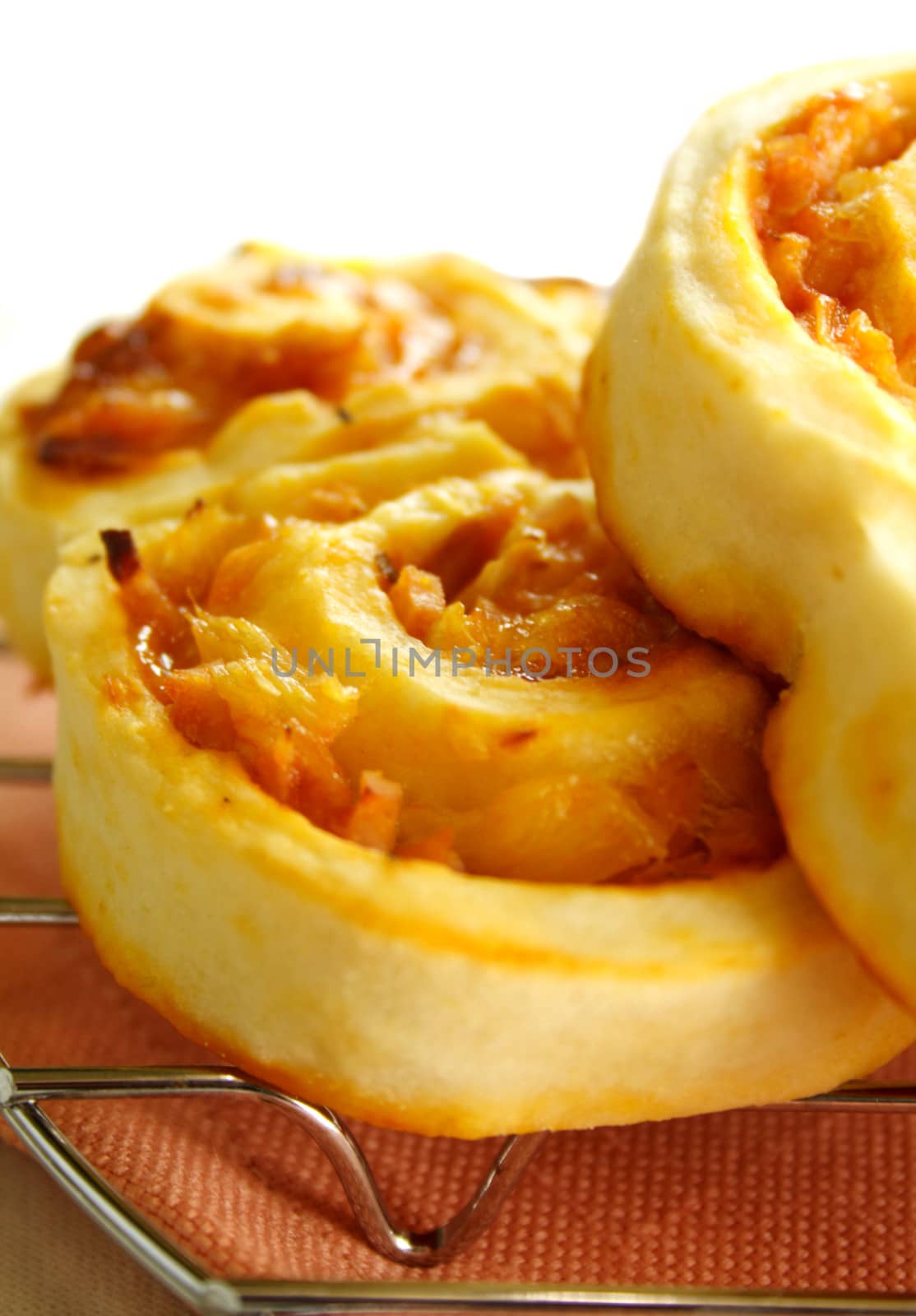 Piping hot baked ham scrolls straight from the oven.