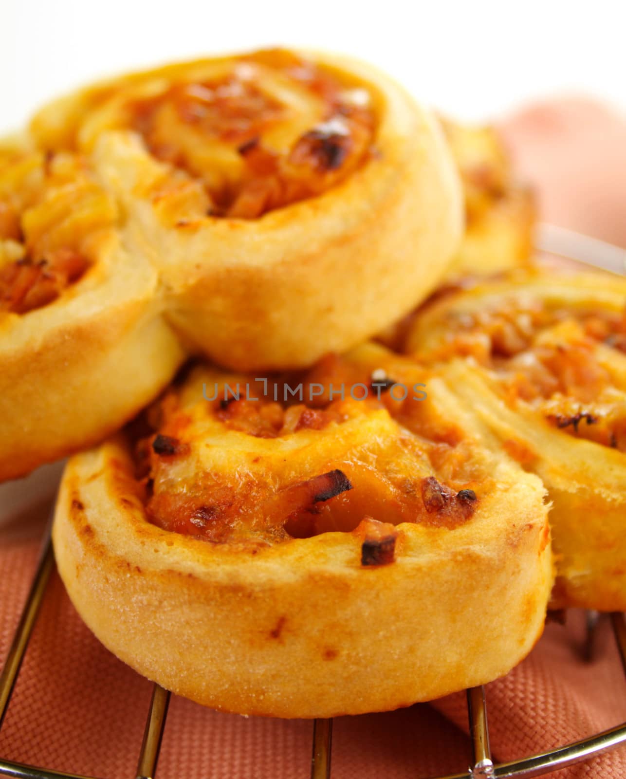 Piping hot baked ham scrolls straight from the oven.