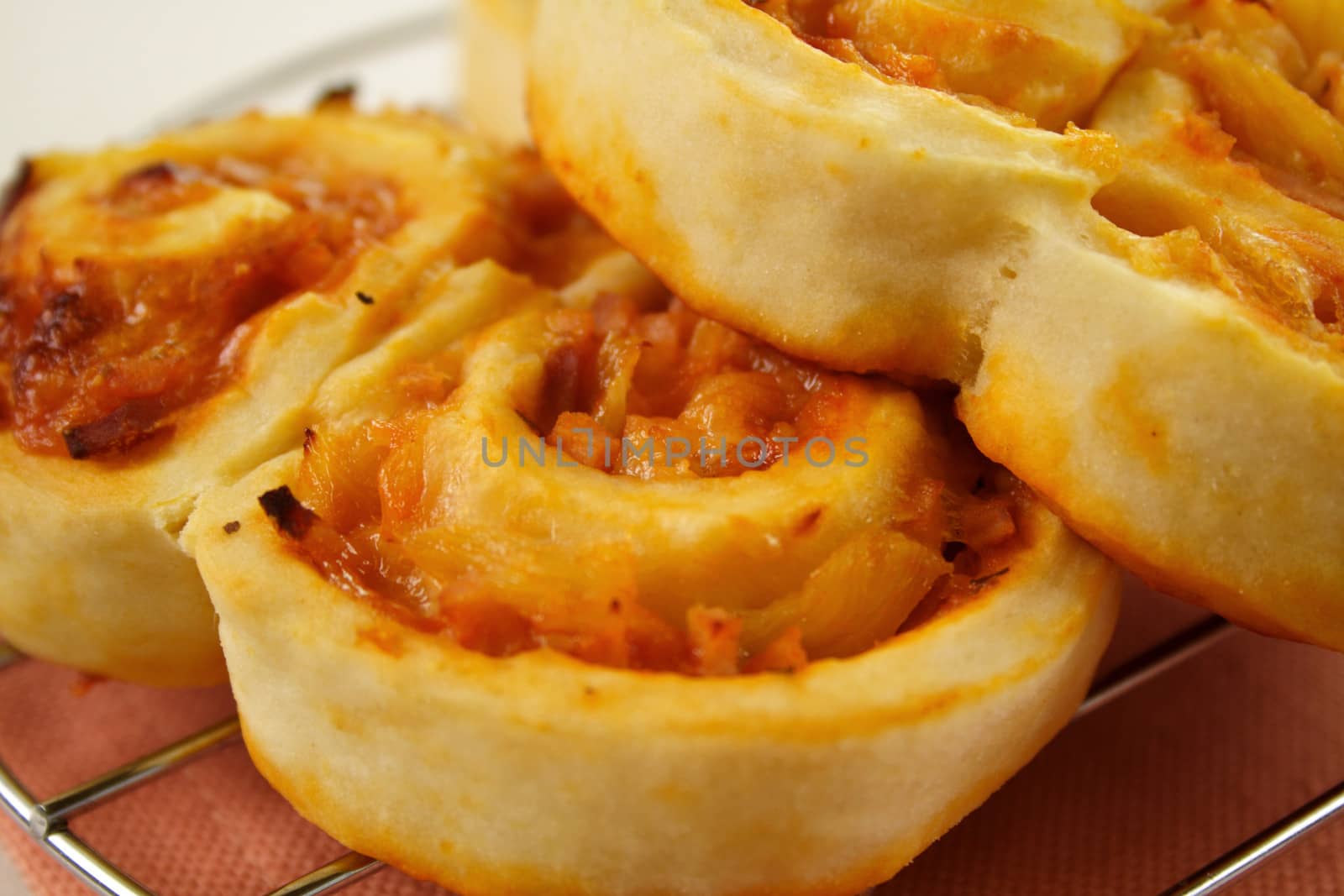 Piping hot baked ham scrolls straight from the oven.