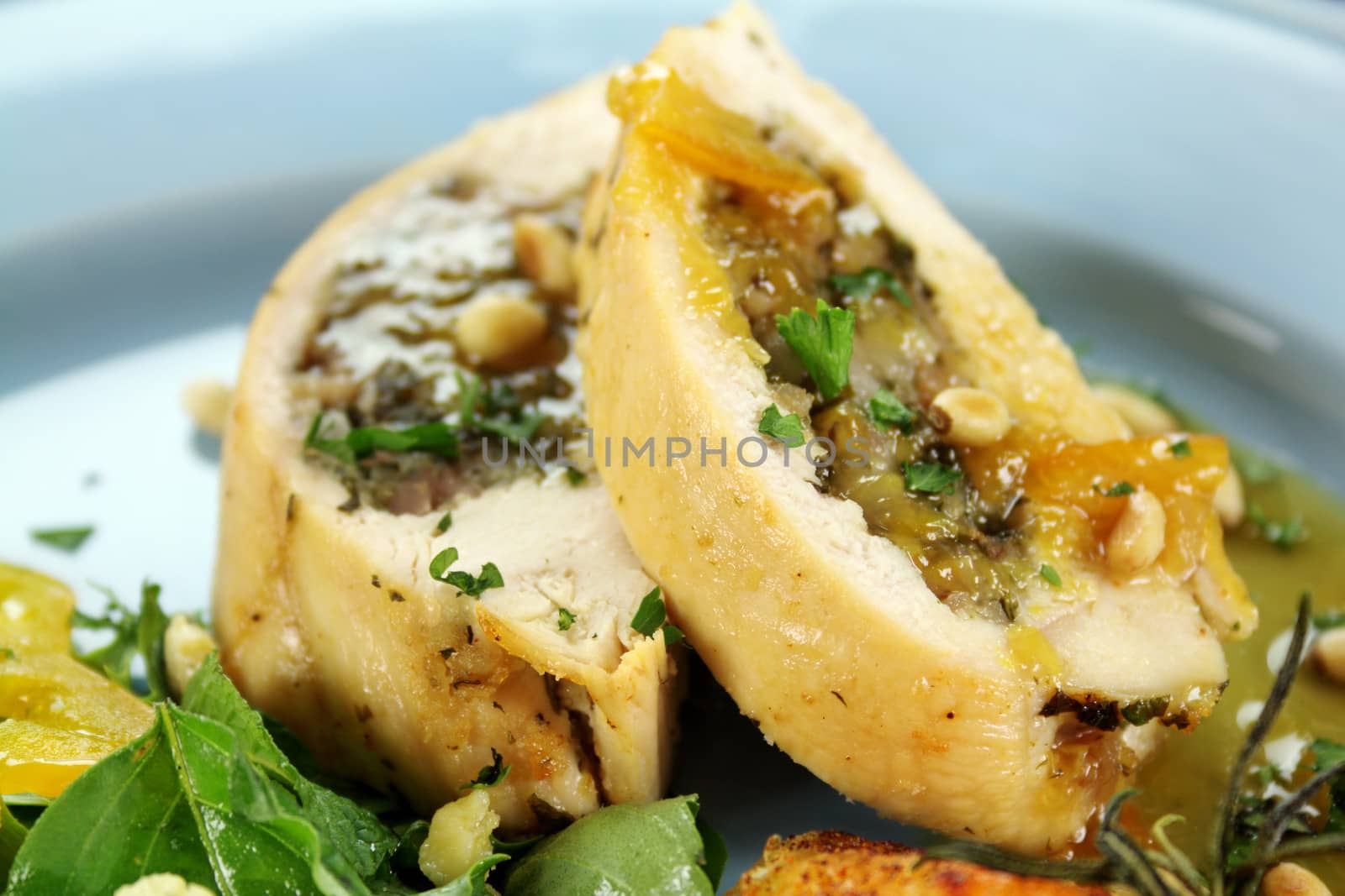 Delicious sliced stuffed chicken with a piquant sauce ready to serve.