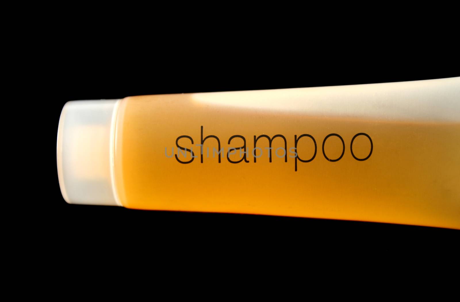 Shampoo in a plastic tube ready for use.