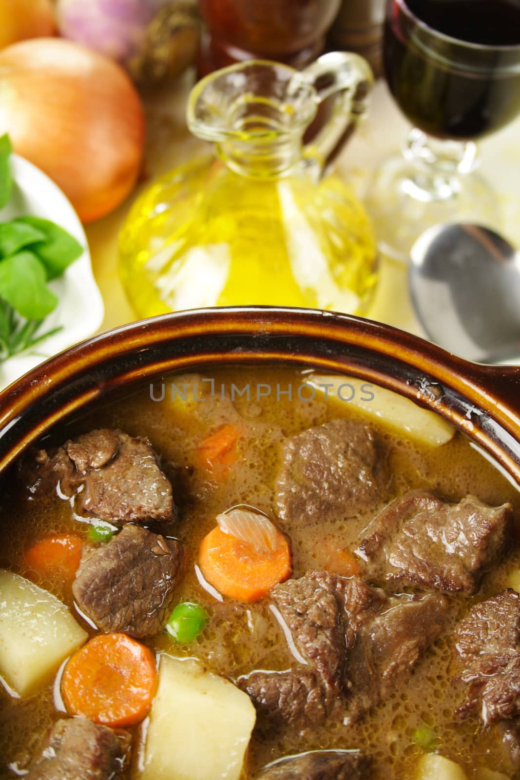 Freshly baked beef stew with olive oil and fresh vegetables.