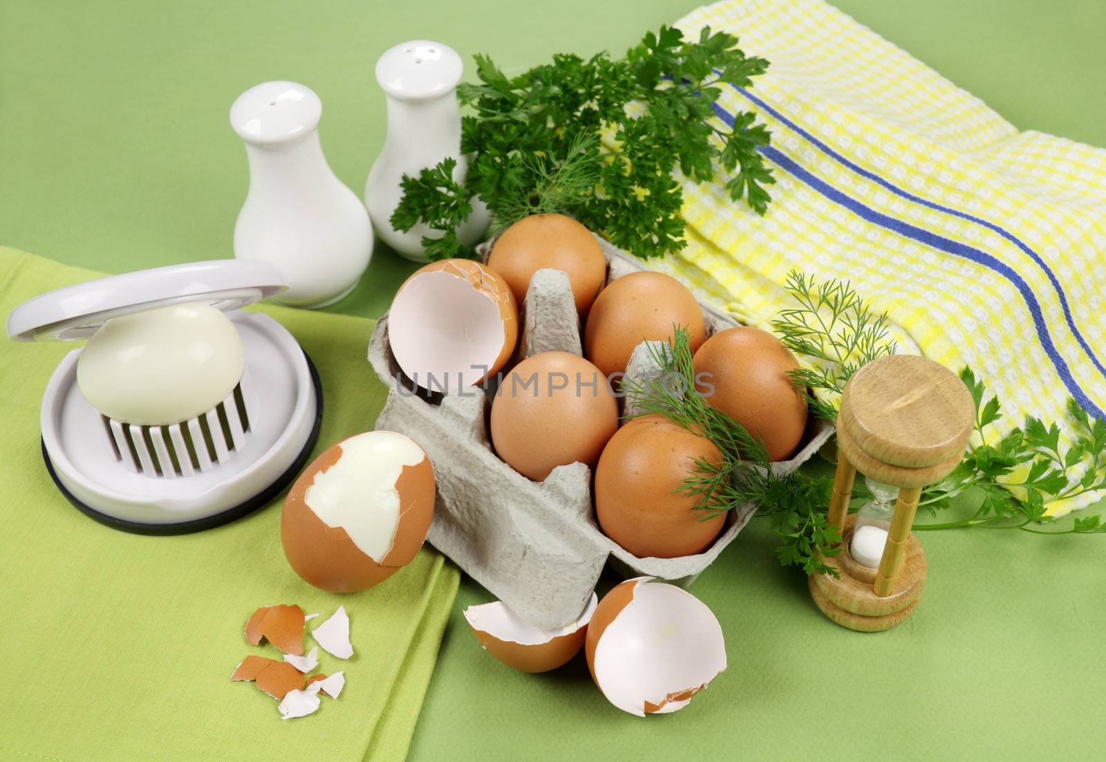 Freshly boiled eggs with garden fresh hebs and an egg slicer.