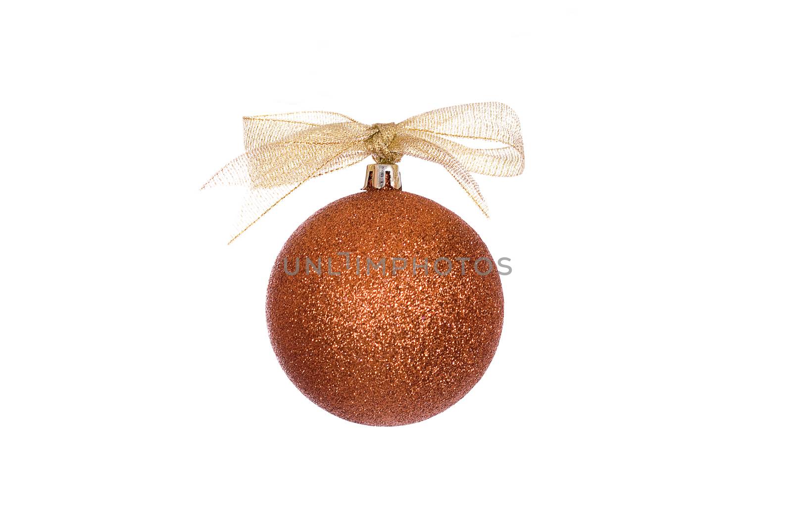 Golden Christmas sphere with ribbon and bow on the white