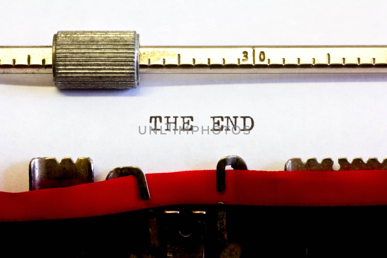 typewriter with the following text: the end