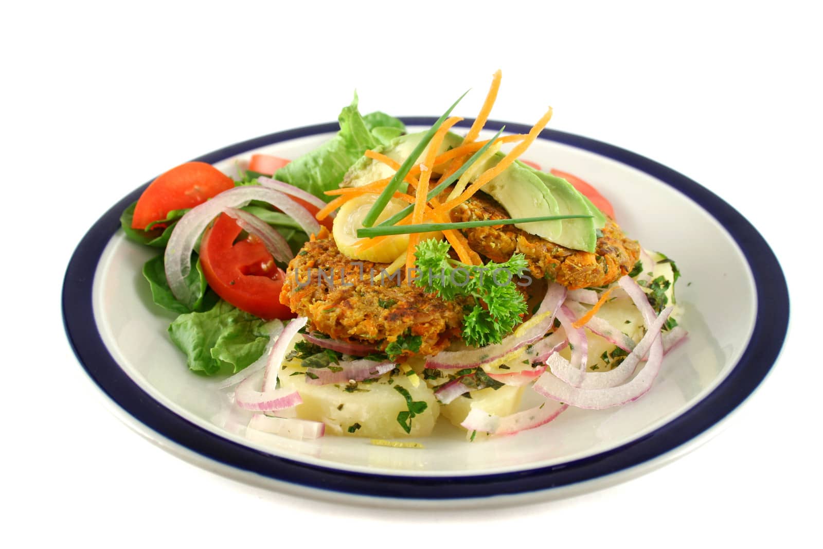 Carrot And tuna patties on a herbed potato stack with salad.