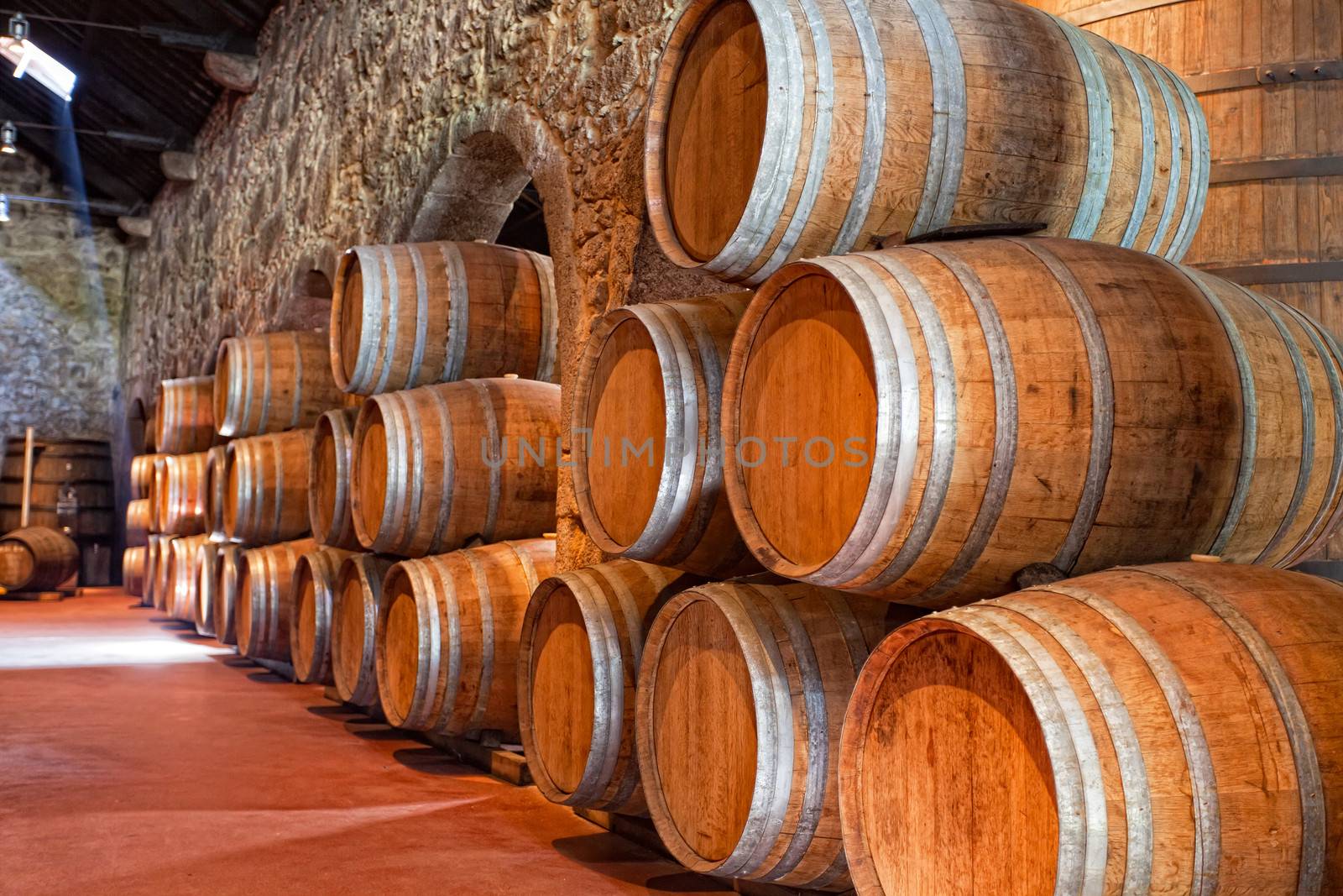 olden casks of different sizes hold Port fortified wine to mature in wine cellars