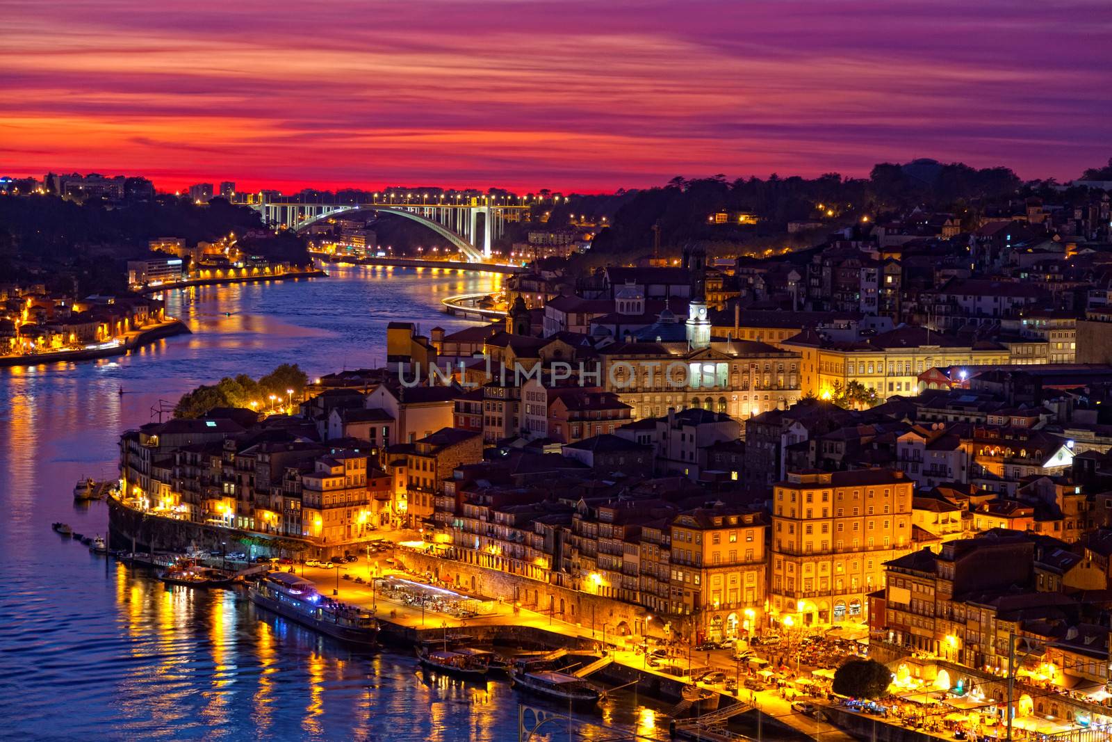 hill with old town of Porto at sunset by elena_shchipkova