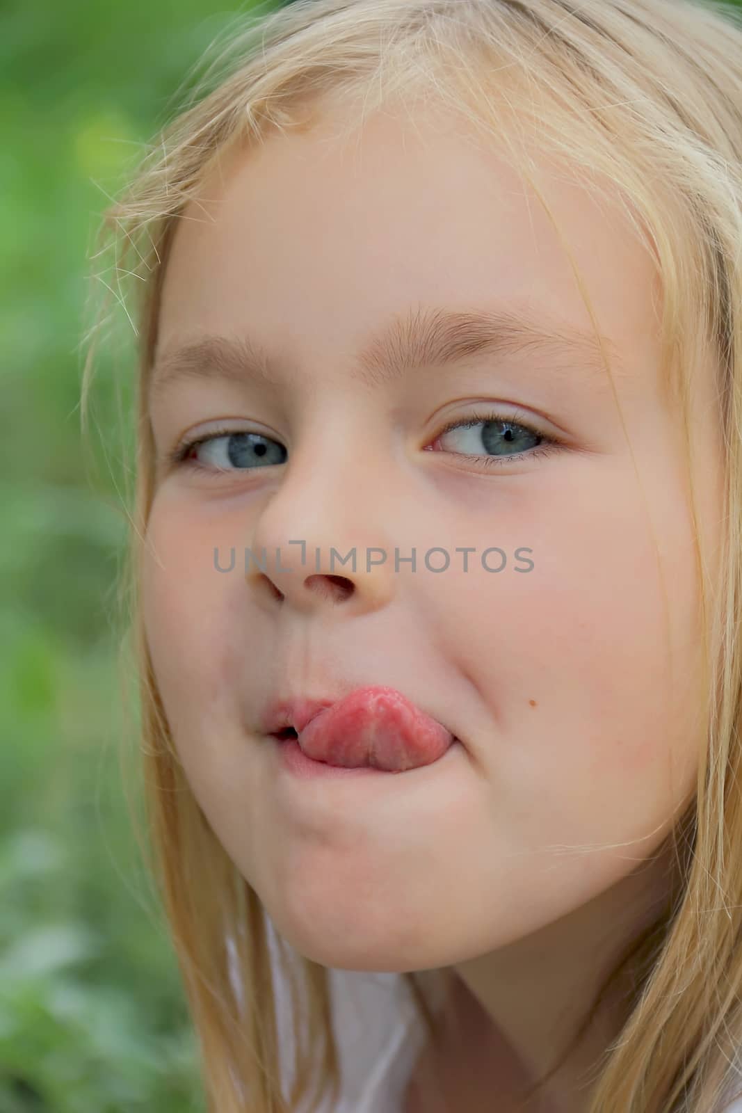 Portrait of girl with smile and makes faces