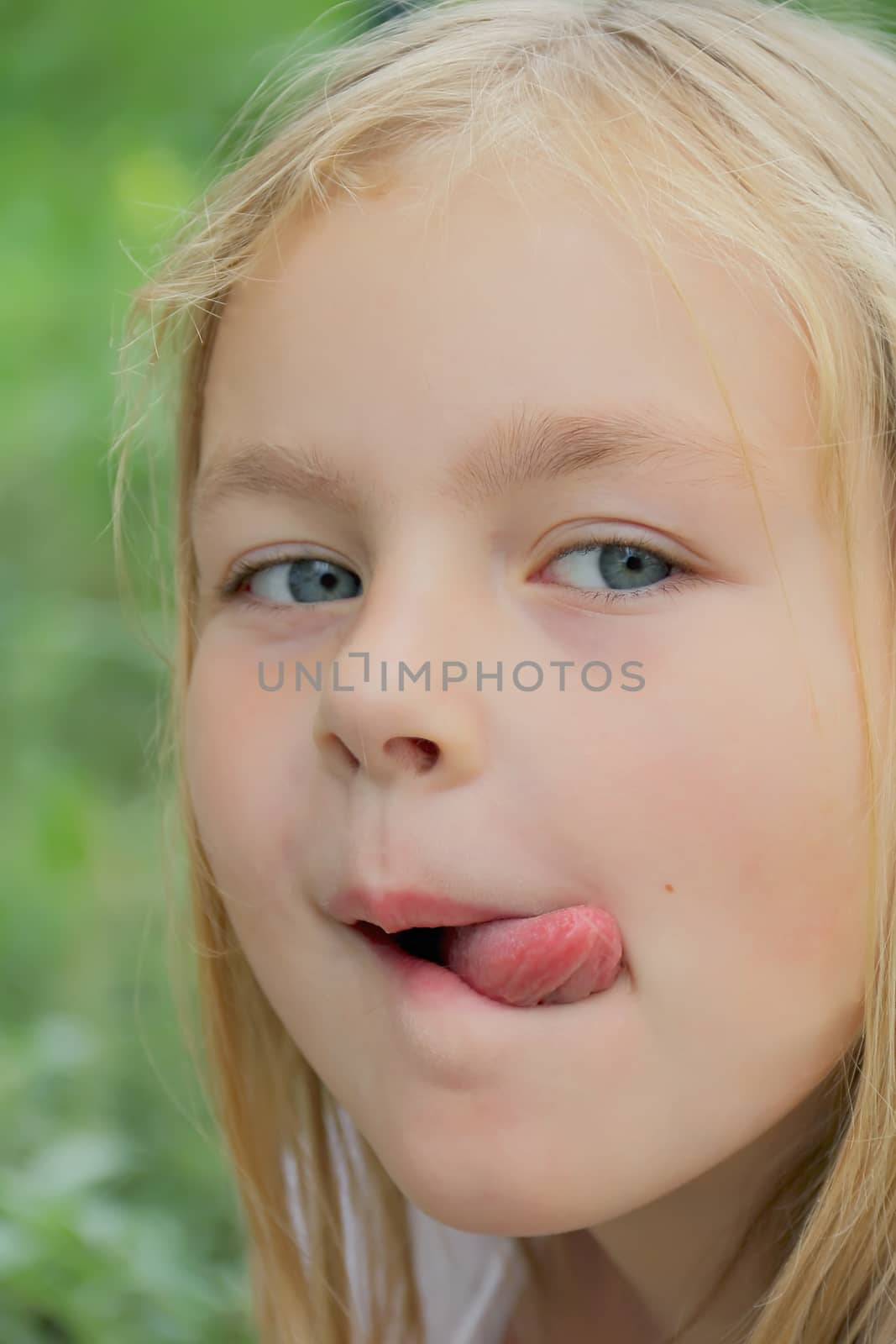 Portrait of girl with smile and makes faces