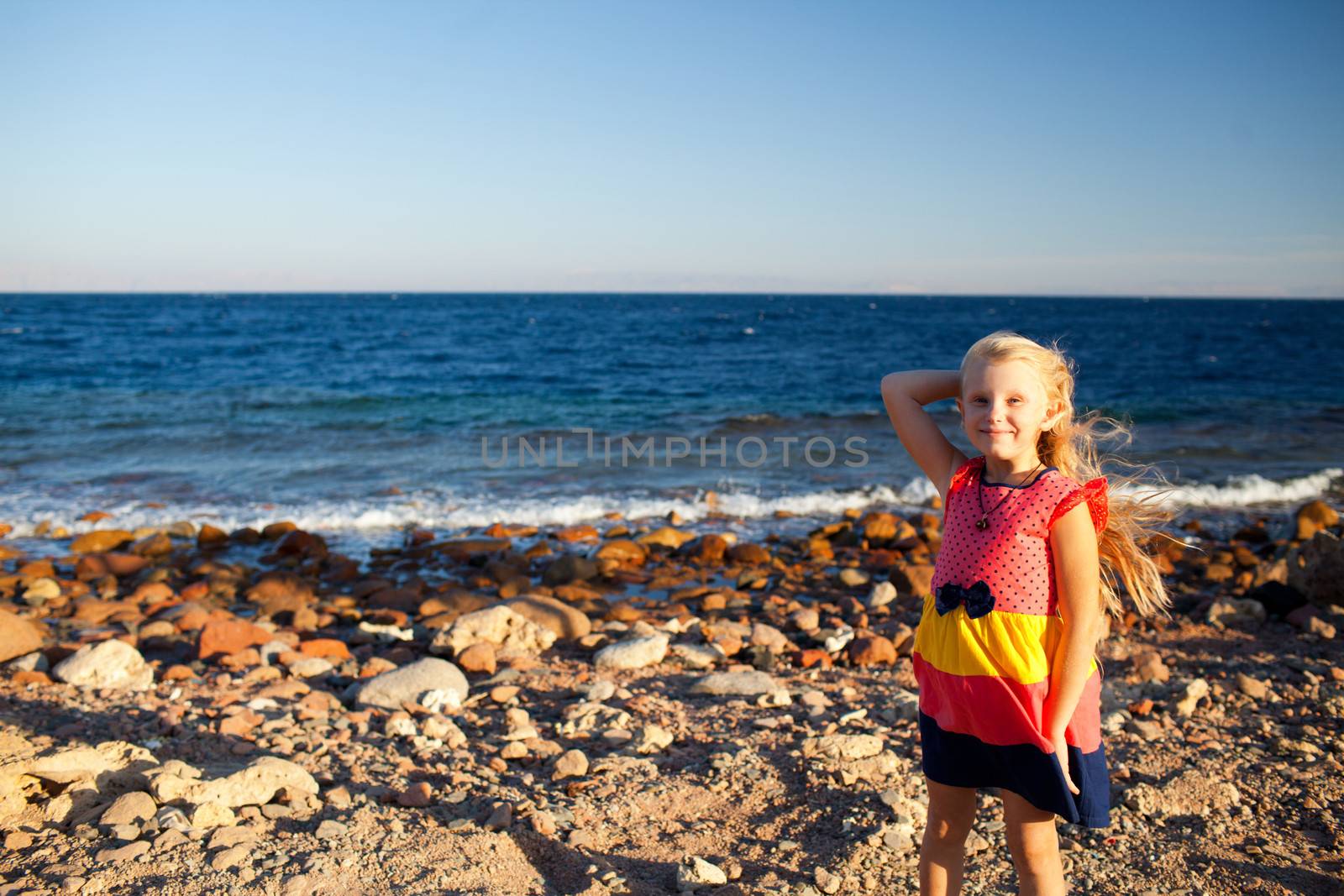 portrait of small girl on the beach