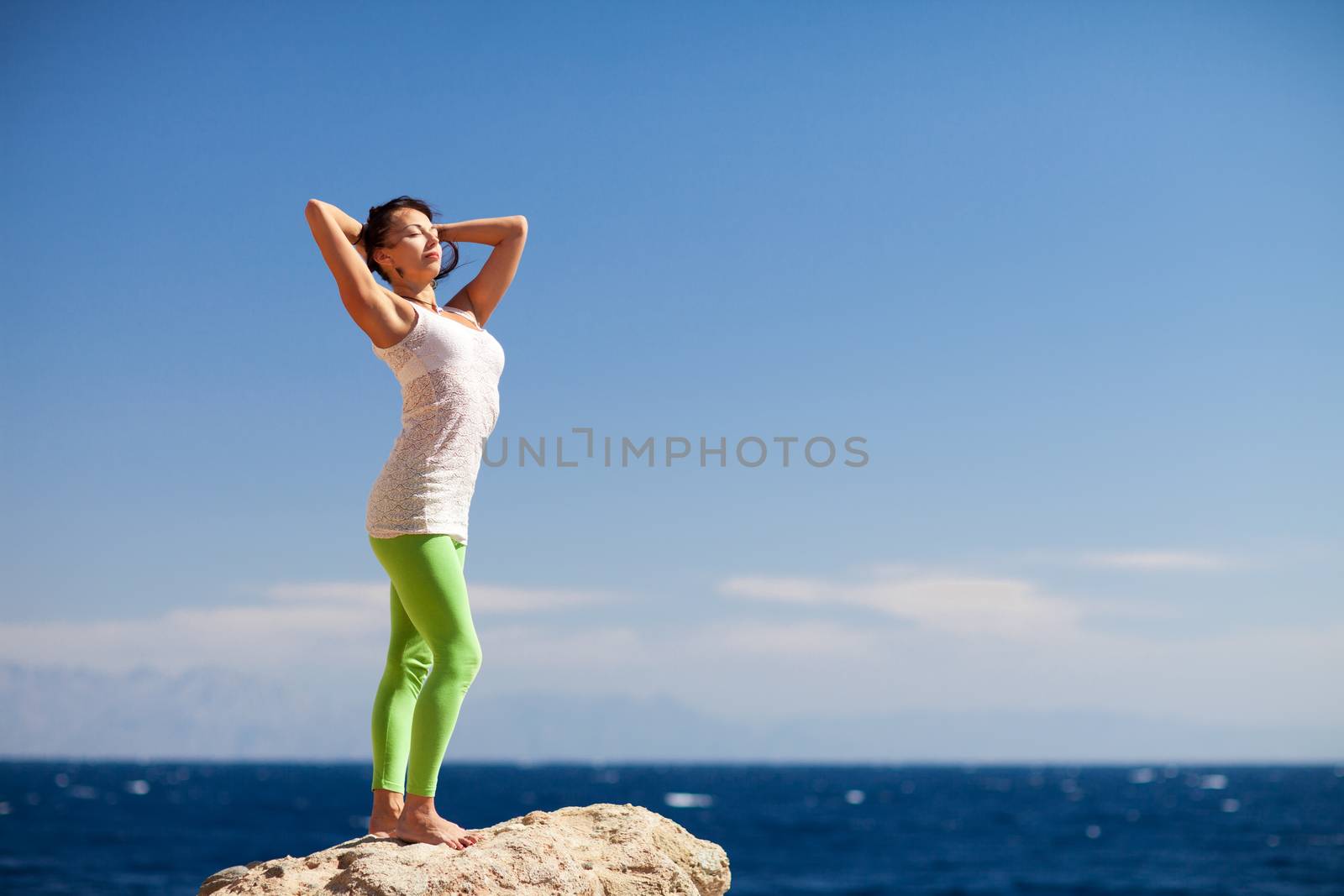 girl on the top of the mountain by vsurkov