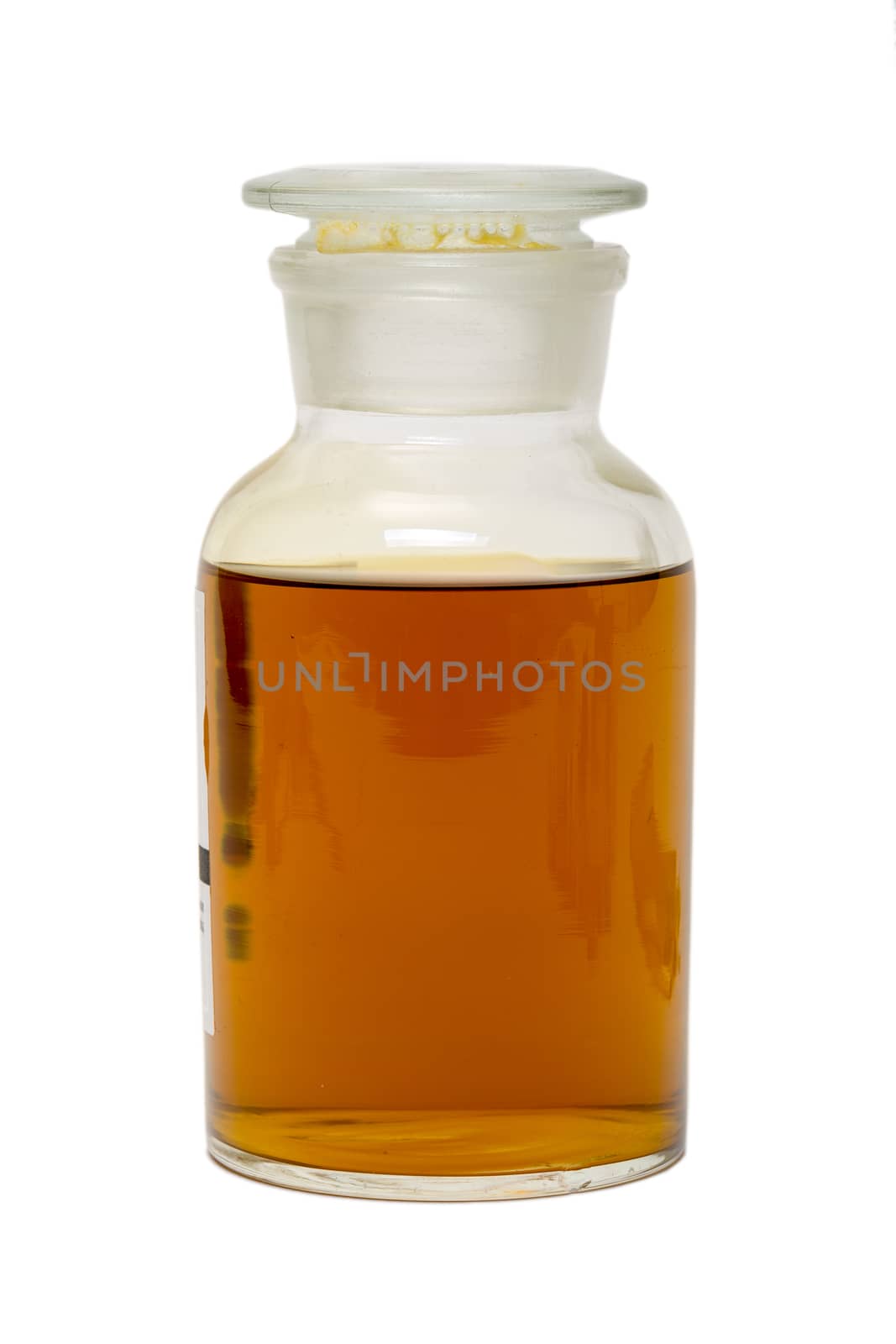 Large Glass Jar with a Lid, Filled with Dark Yellow Honey by Discovod