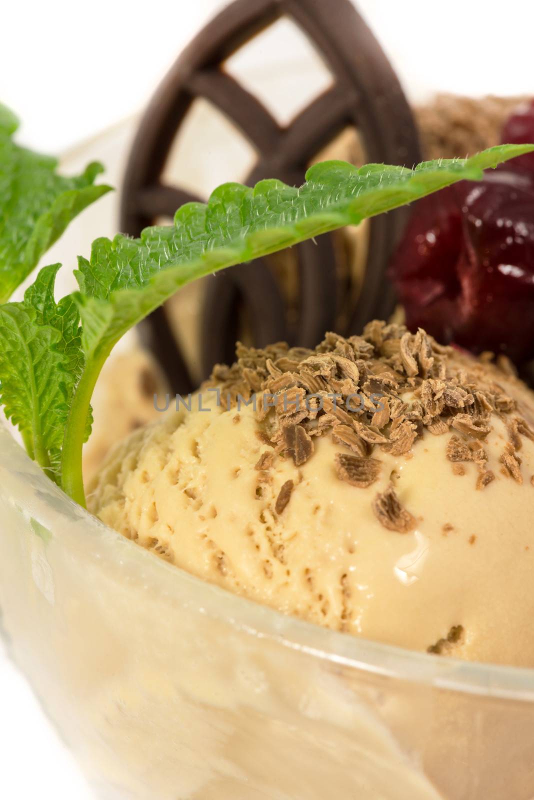 Brylle ice cream with chocolate and drunken cherries and mint leaf