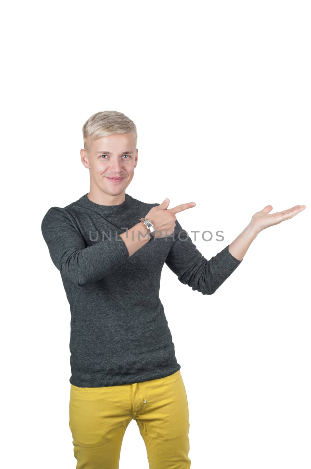 Shot of man in yellow and gray pointing with his fingers, isolated