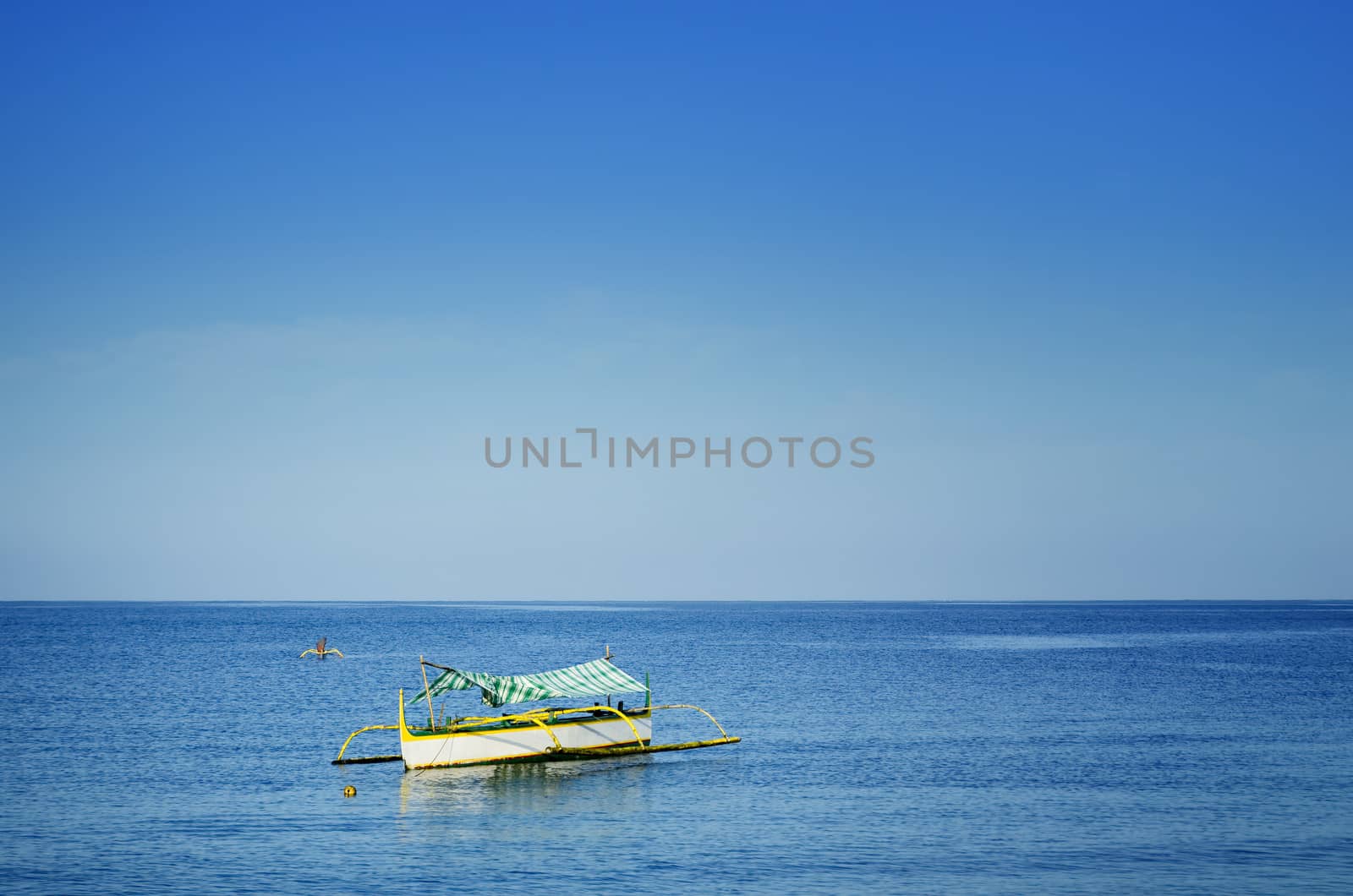 Two small fisherman outrigger off the coast, Philippines