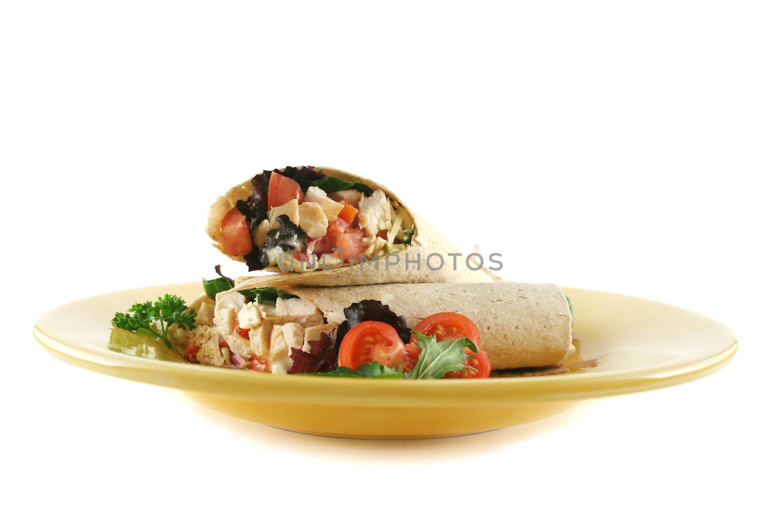 Healthy chicken and salad wrap ready to serve.