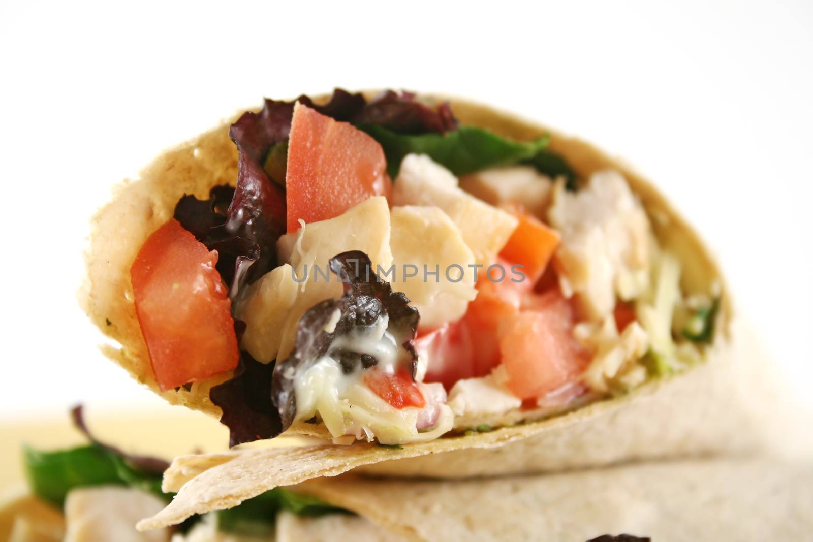 Healthy chicken and salad wrap ready to serve.