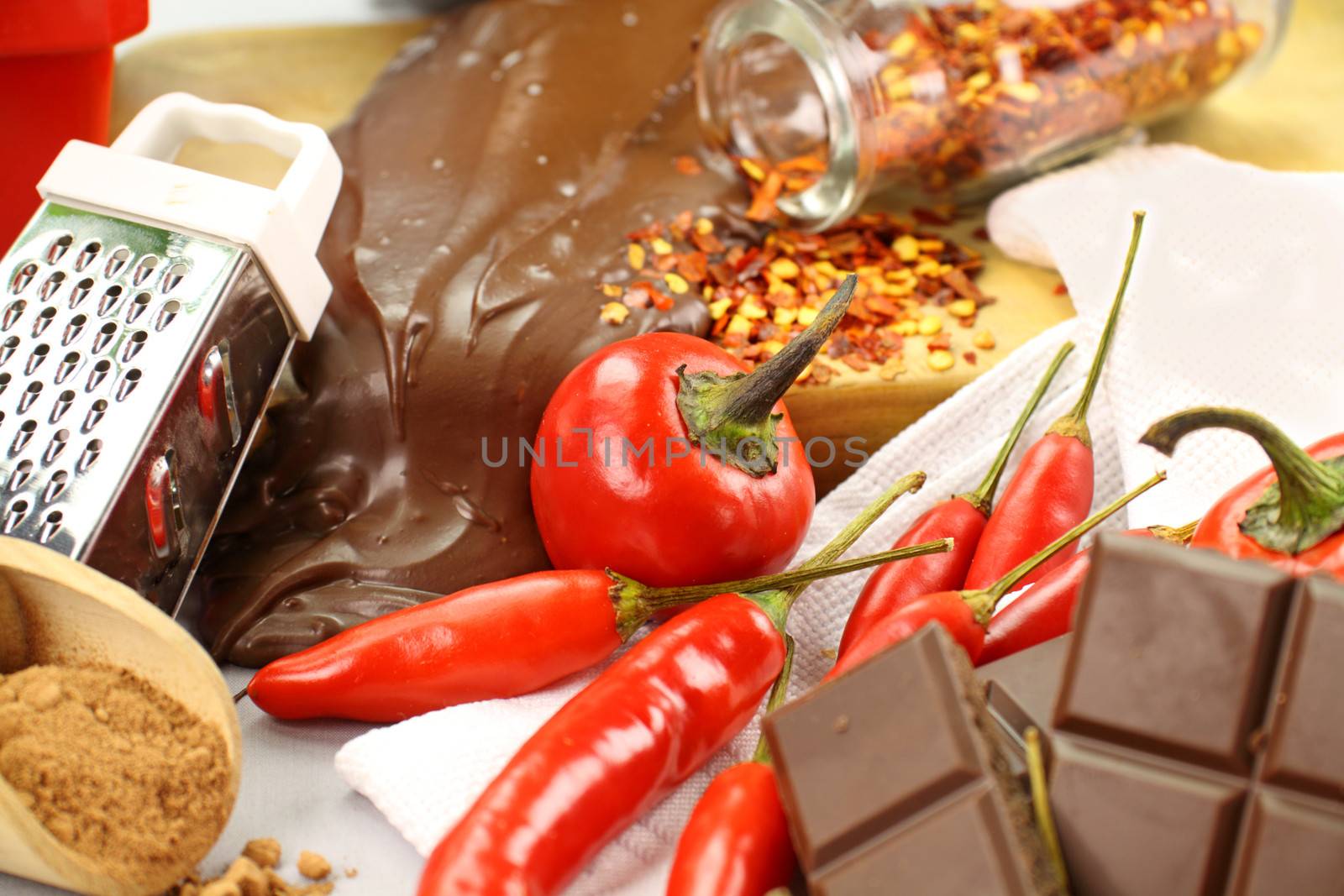 Delicious dark chocolate with a selection of different chilies and peppers.