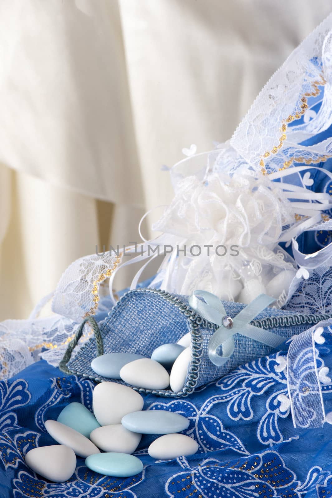 flowers candy and weddings favors on white background