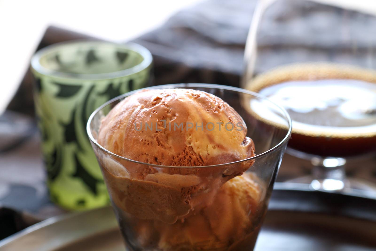 Delicious fresh caramel ice cream in a glass ready to serve.