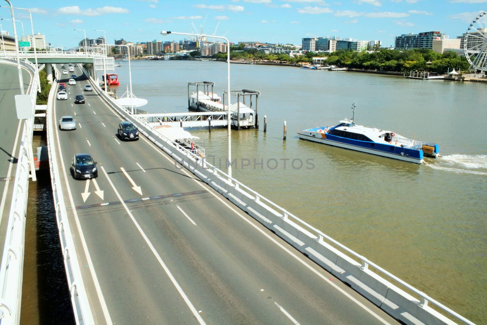 The Riverside Expressway which runs parallel to the Brisbane River in Queensland Australia with Southbank in the background.