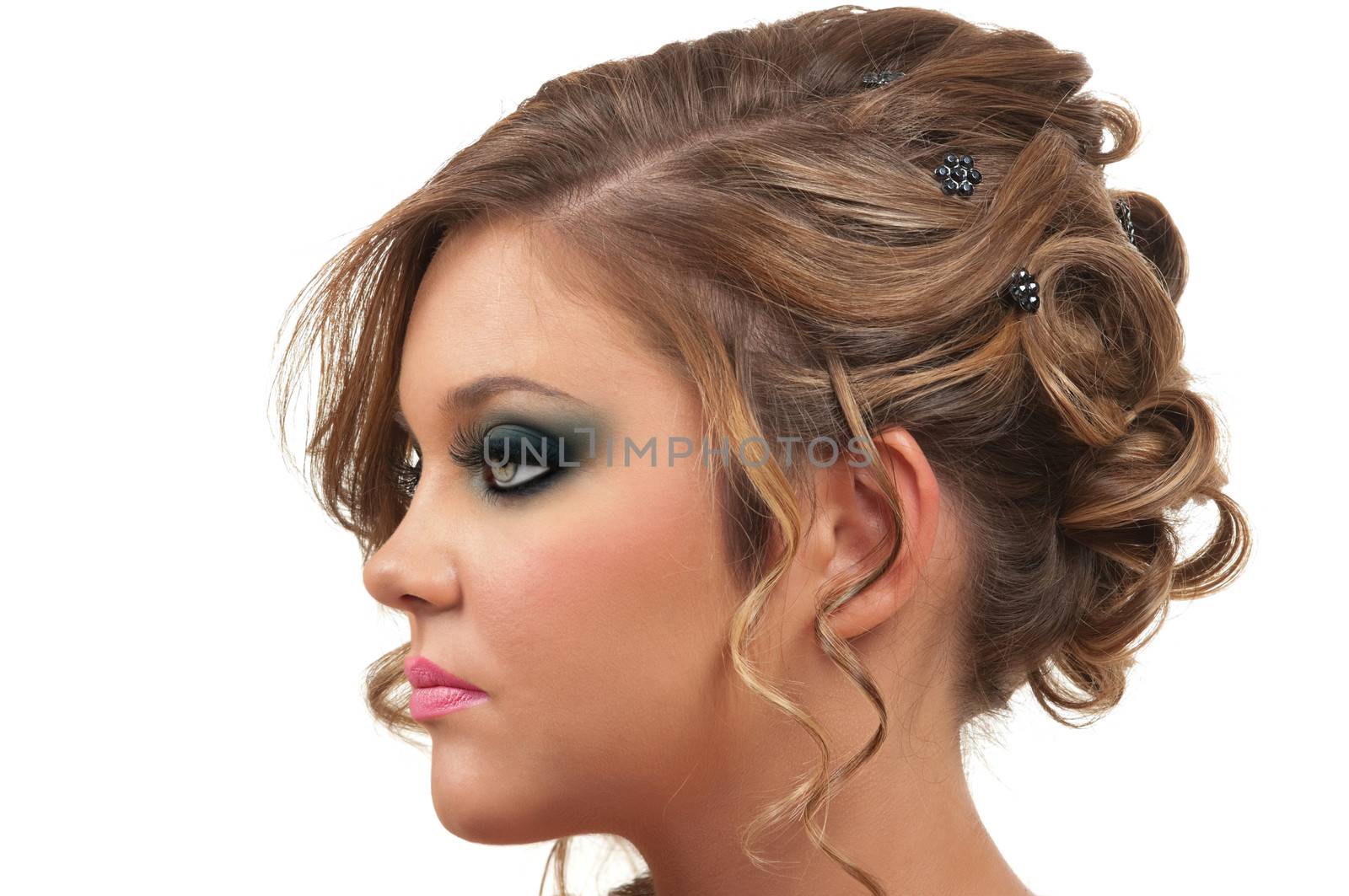 Young woman with beautiful hair do and smokey eye make up