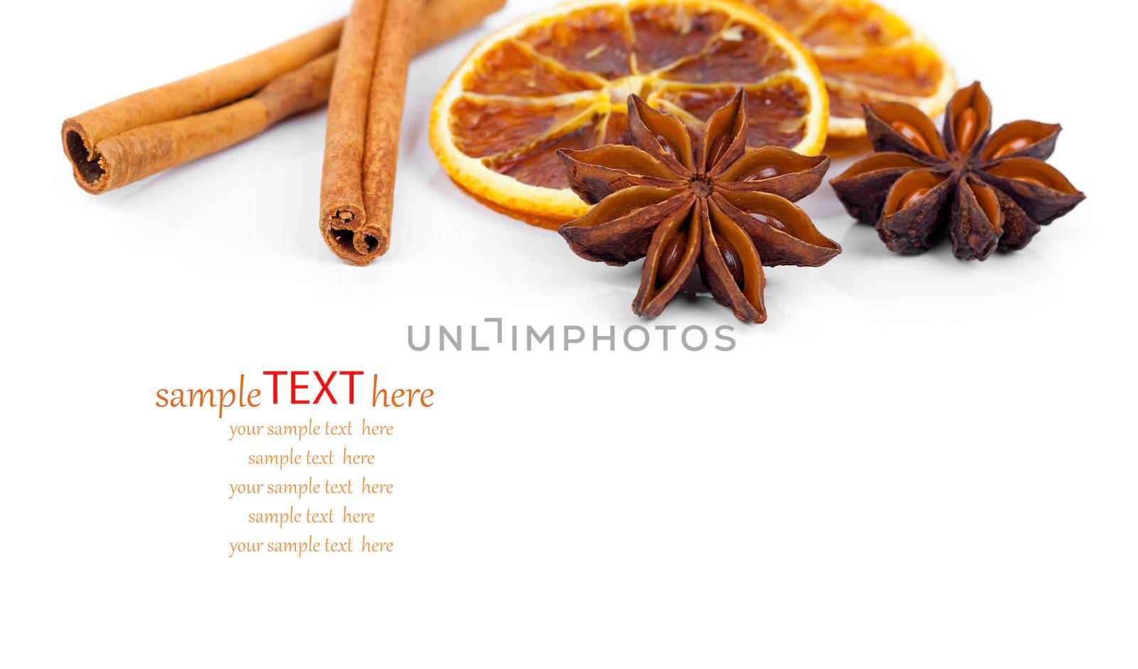 dry orange, cinnamon and Star Anise with copy space, on white background