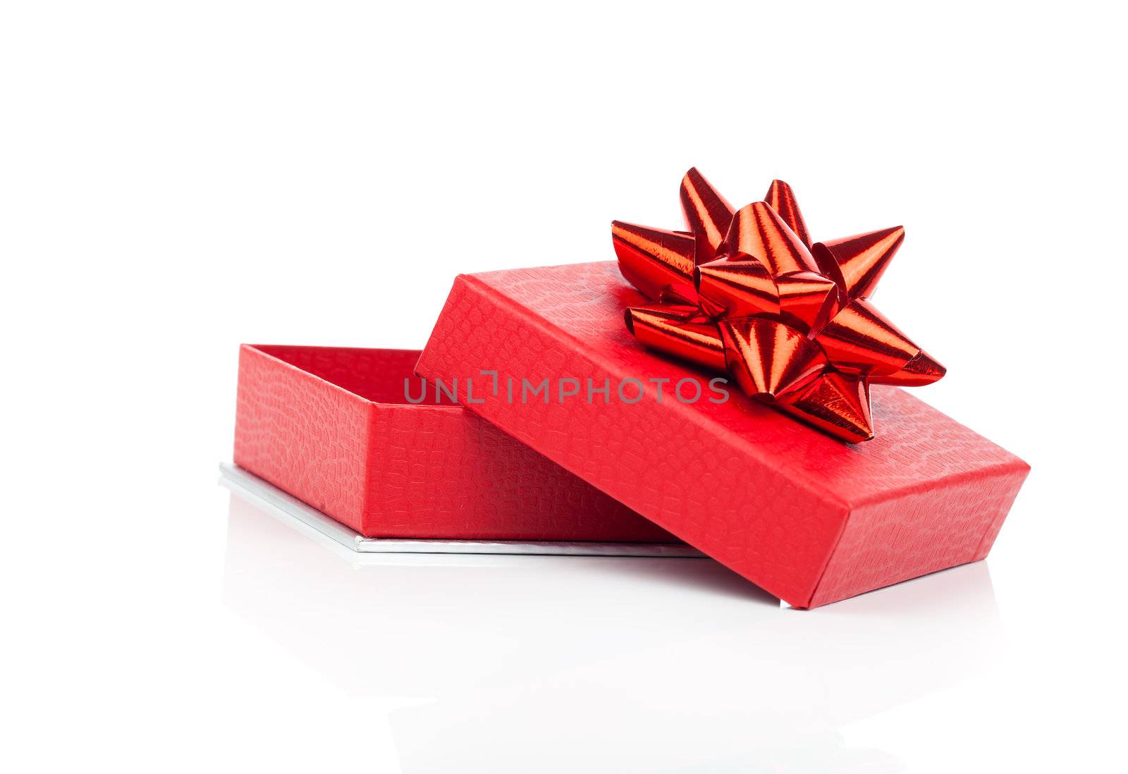 red gift box with bow on white background