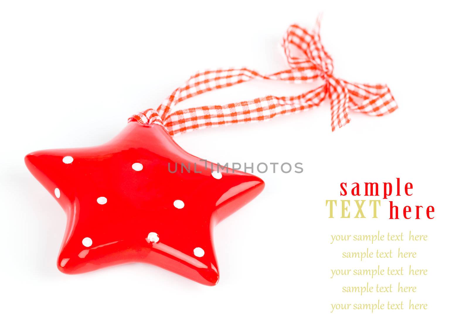 Christmas star ornament of porcelain, on white background