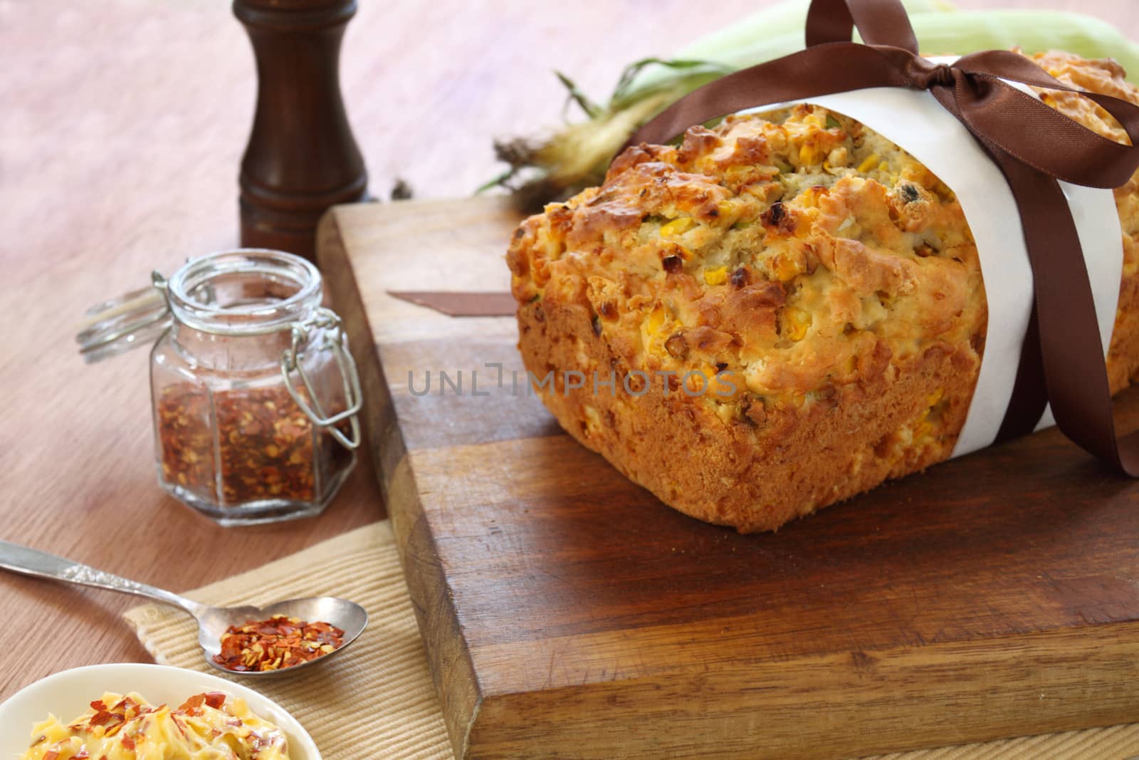 Fresh baked corn bread with corn cobs ready to serve.
