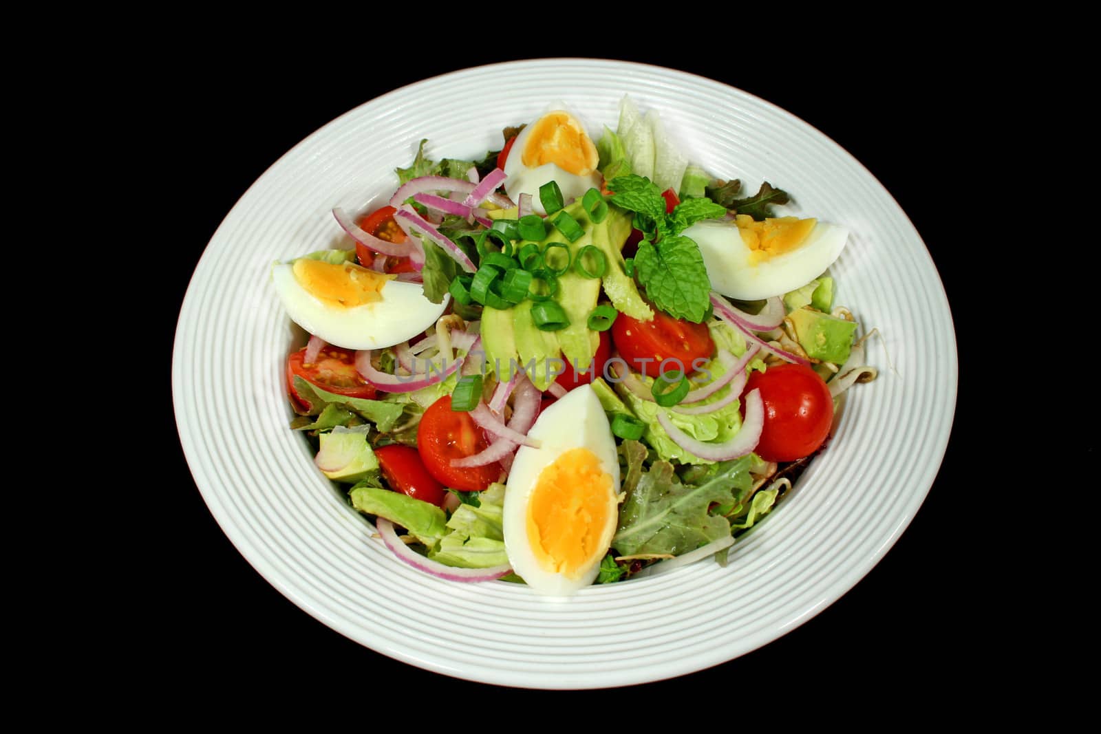 Delightful egg and avocado salad ready to serve.