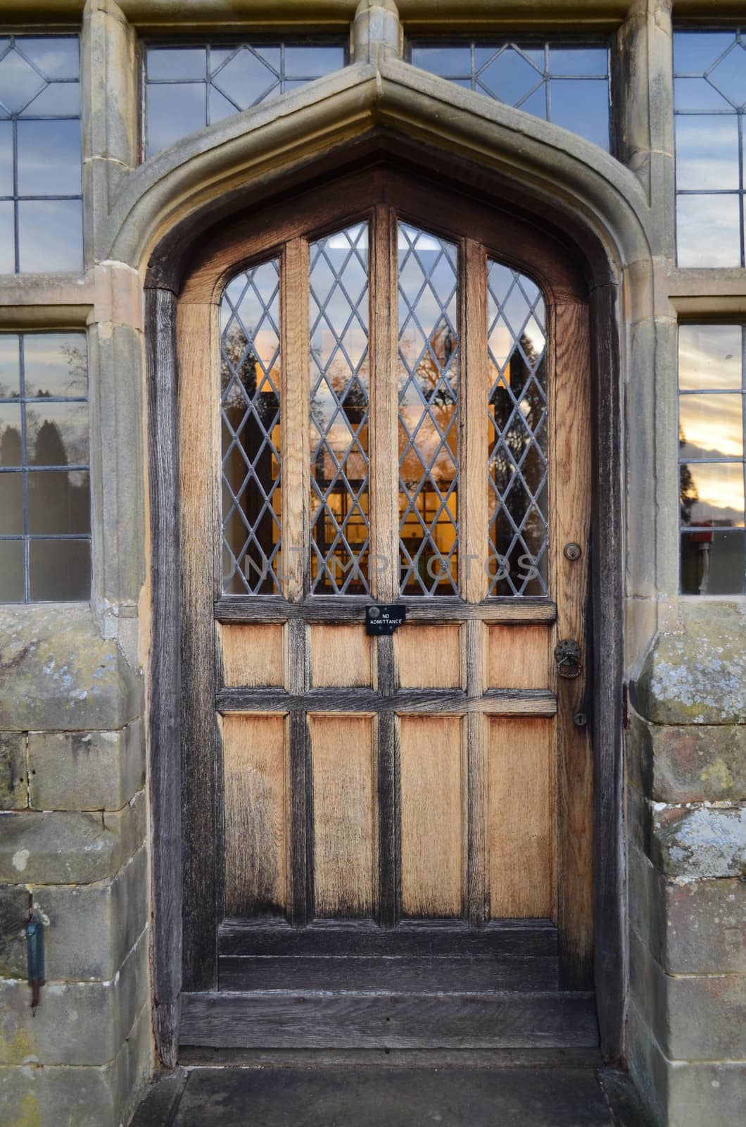 Weathered wooden door at a English Country house.