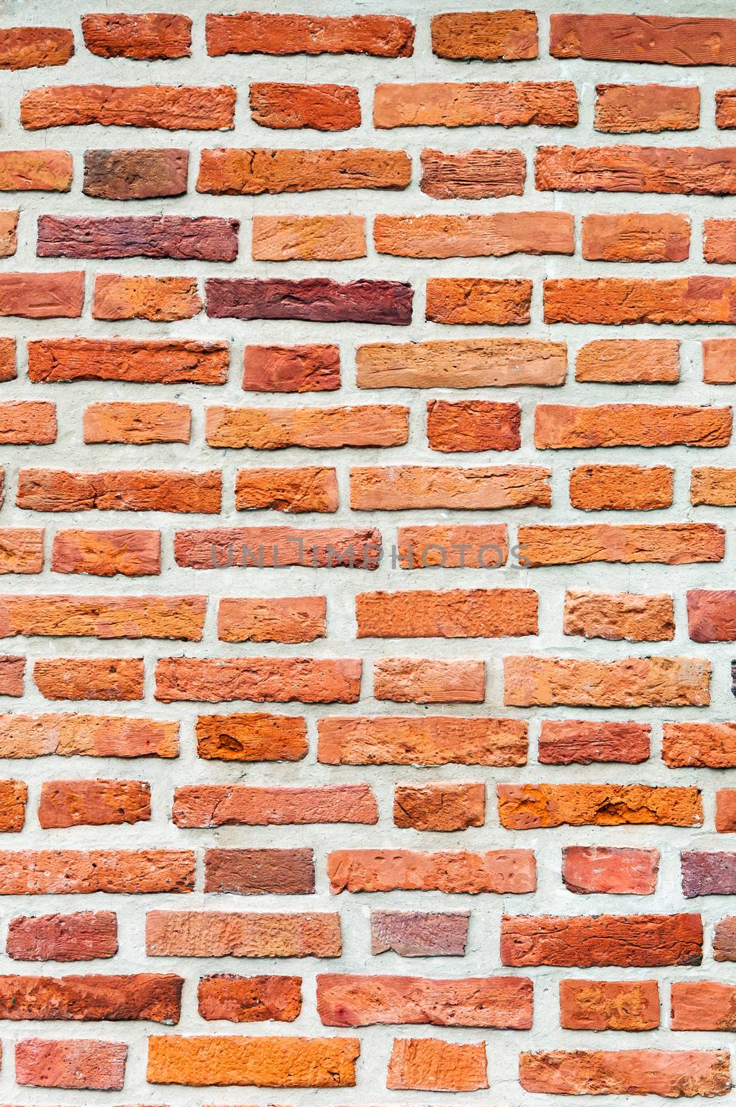Red and orange brick wall texture, background