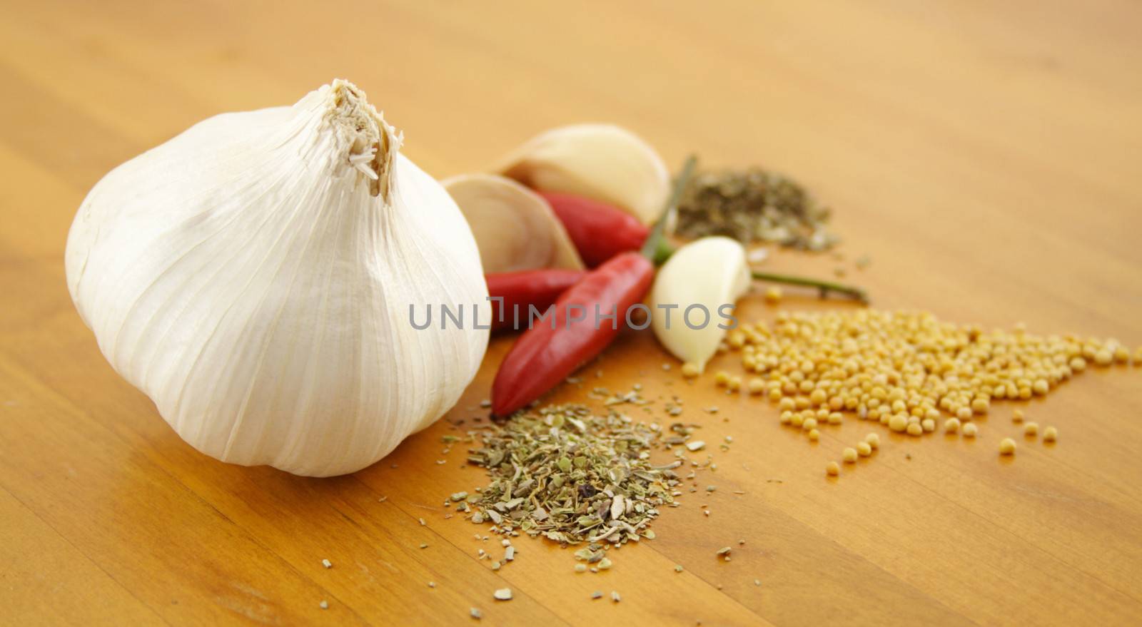 Garlic with chillies, oregano, mustard seeds and basil.