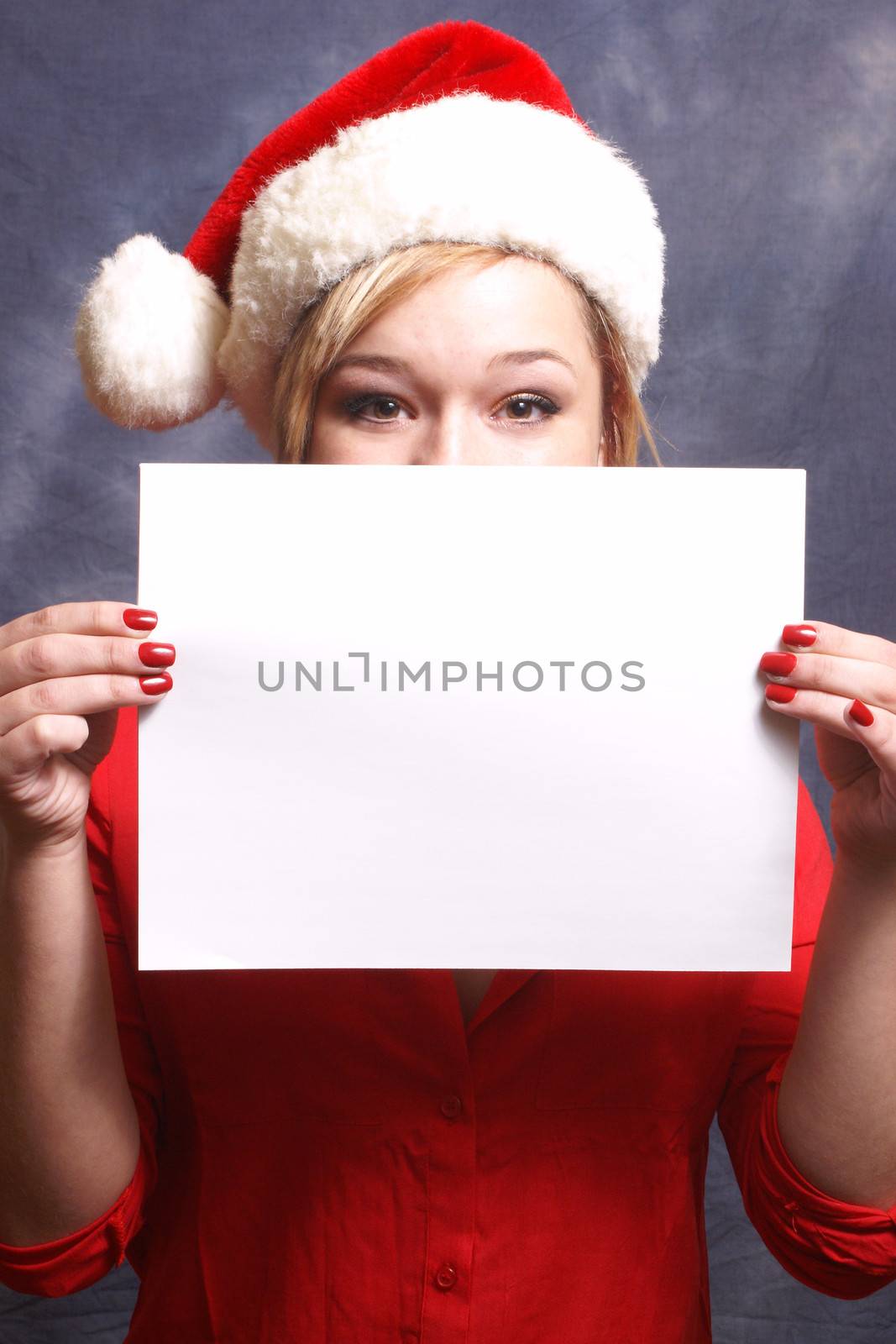 A festive woman holds up a sign for your message.